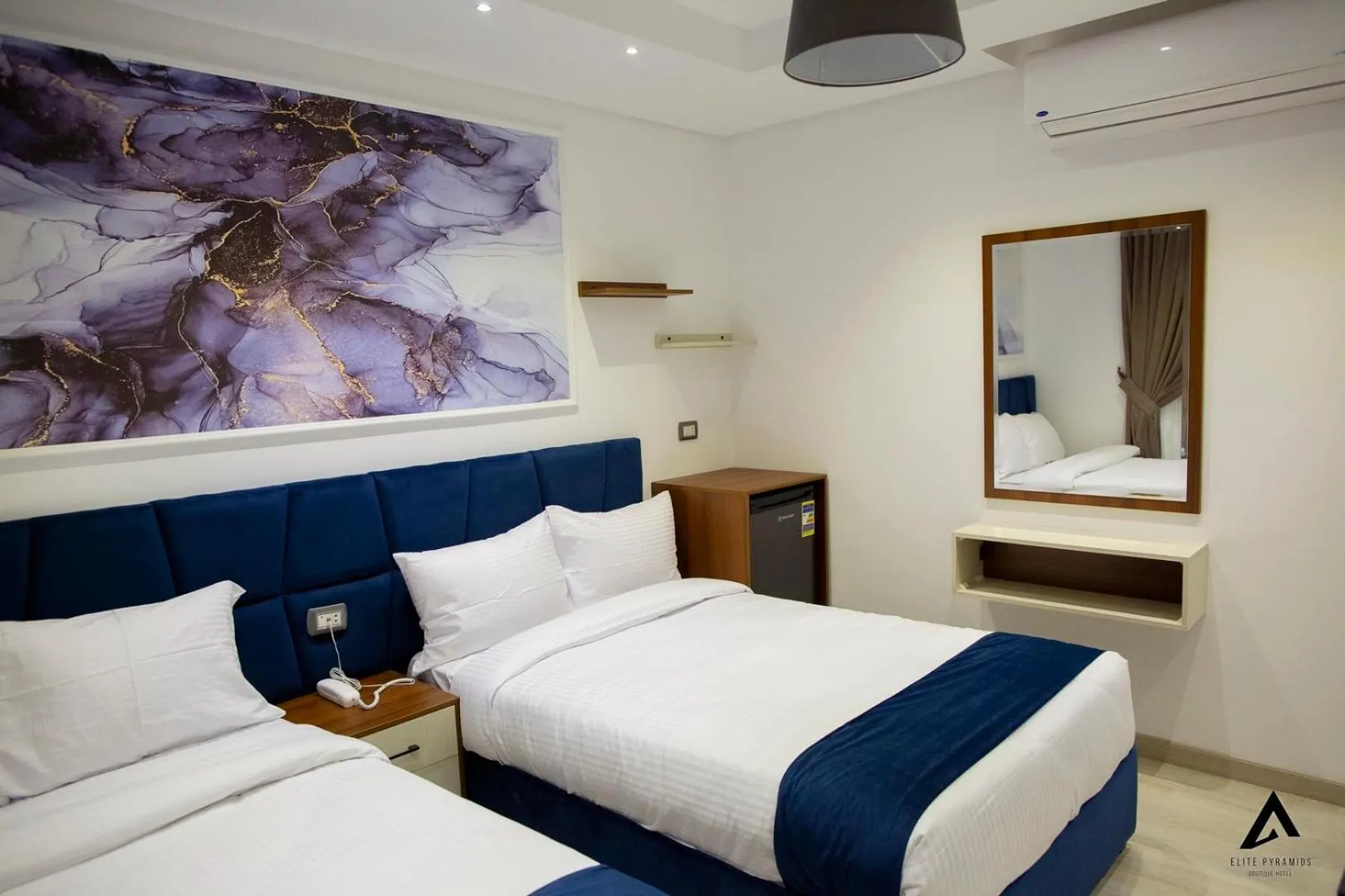 Bed in Elite Pyramids Boutique Hotel