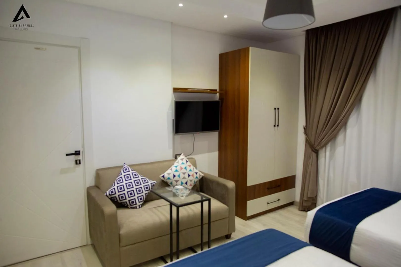 Bed in Elite Pyramids Boutique Hotel