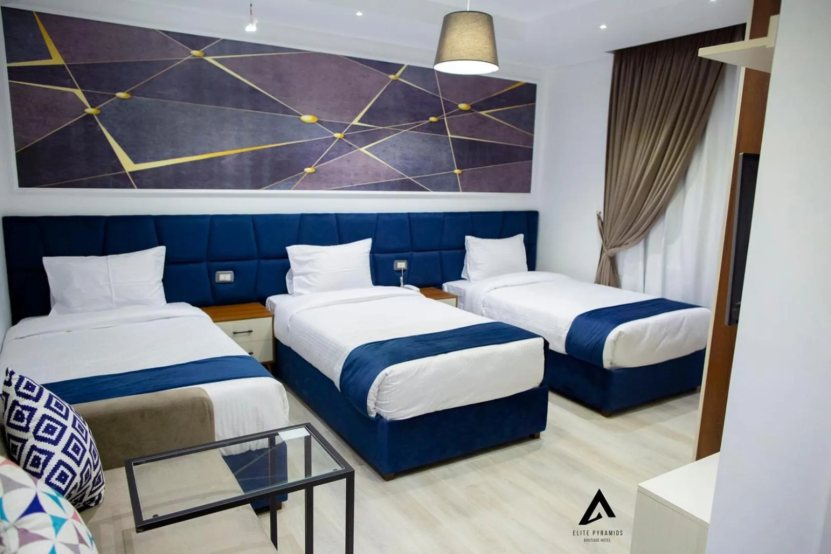 Bed in Elite Pyramids Boutique Hotel