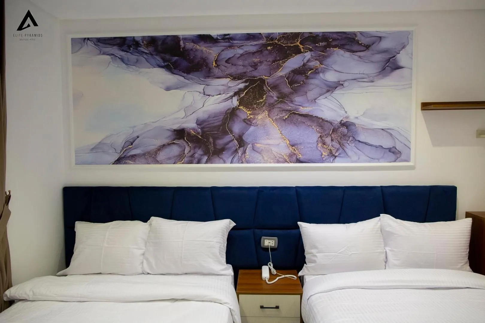 Bed in Elite Pyramids Boutique Hotel