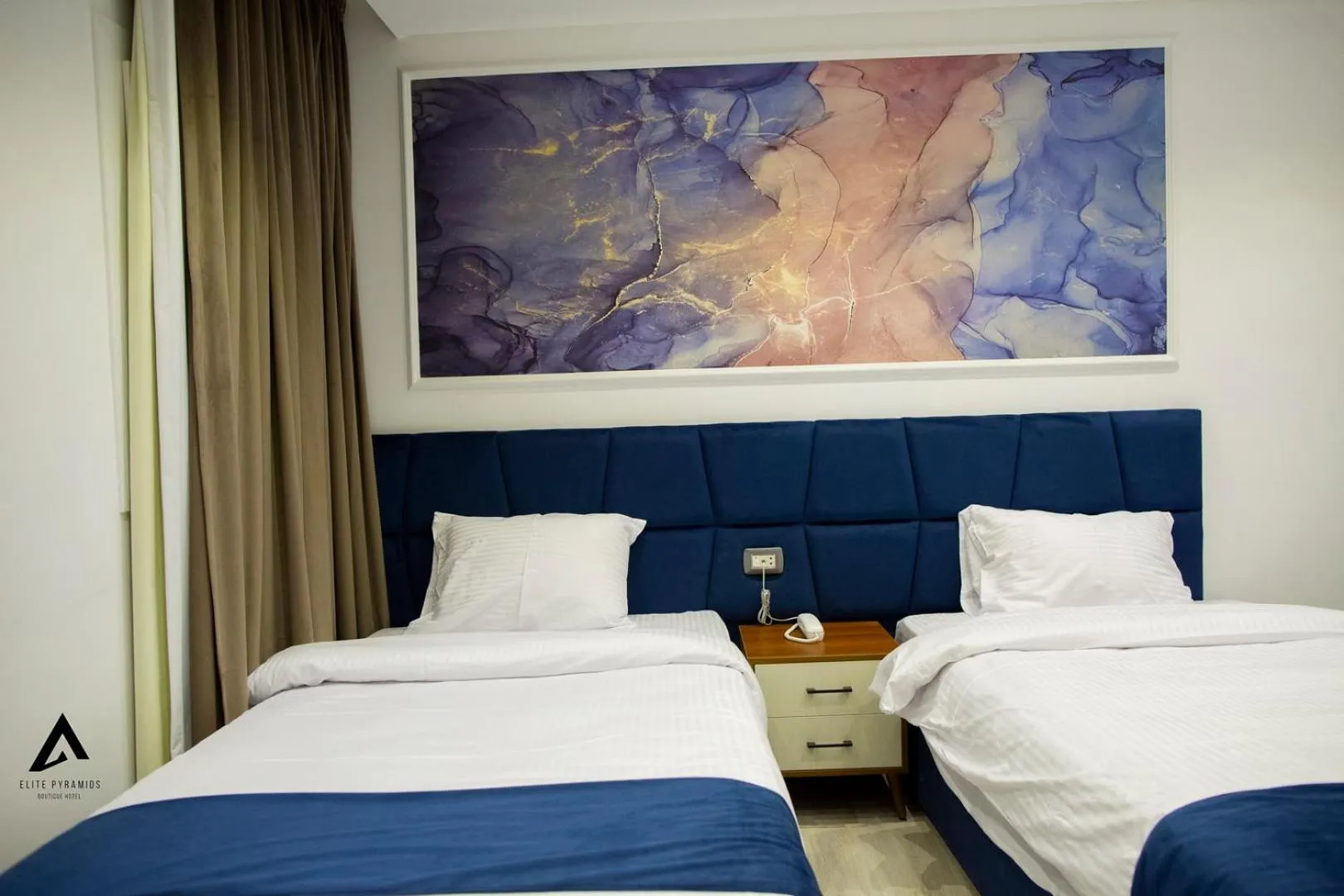 Bed in Elite Pyramids Boutique Hotel