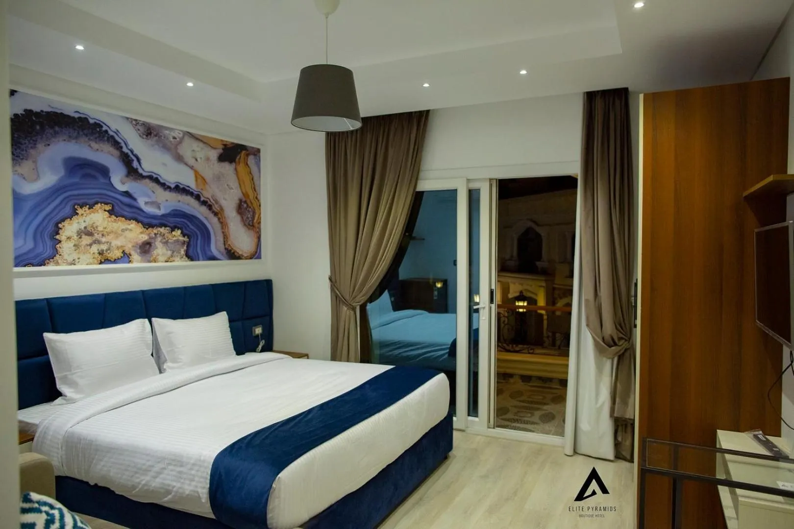 Bed in Elite Pyramids Boutique Hotel