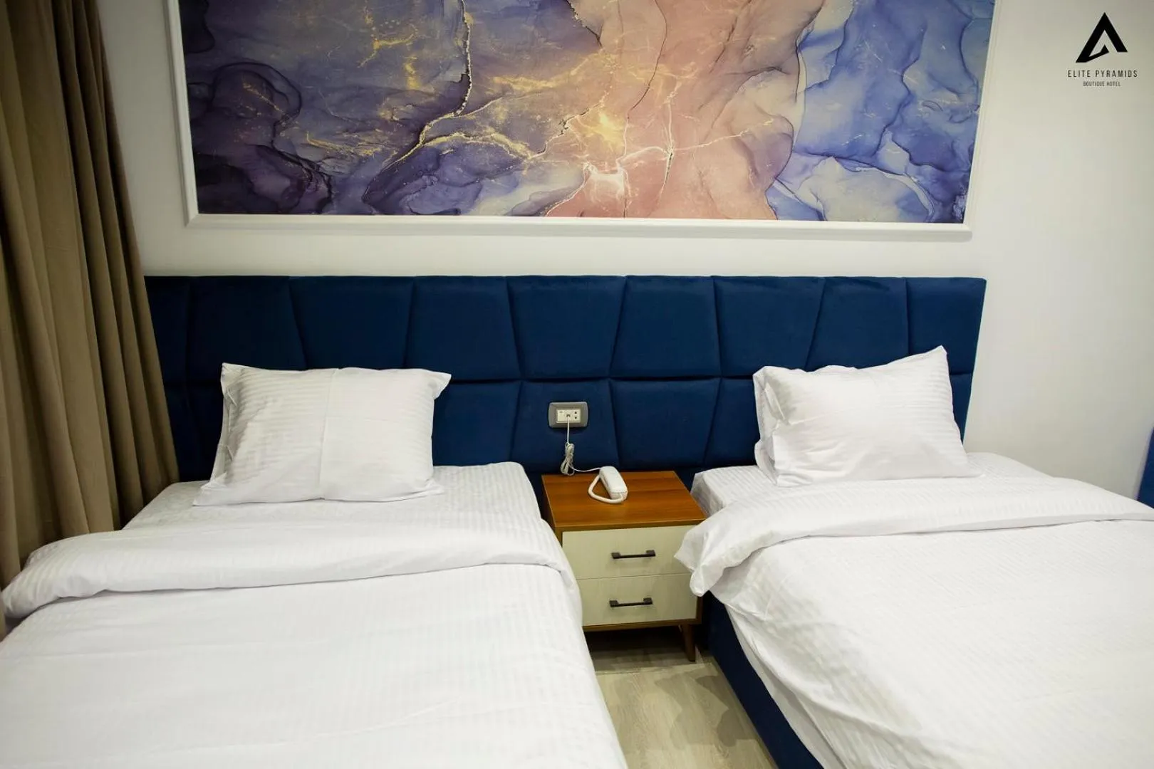 Bed in Elite Pyramids Boutique Hotel