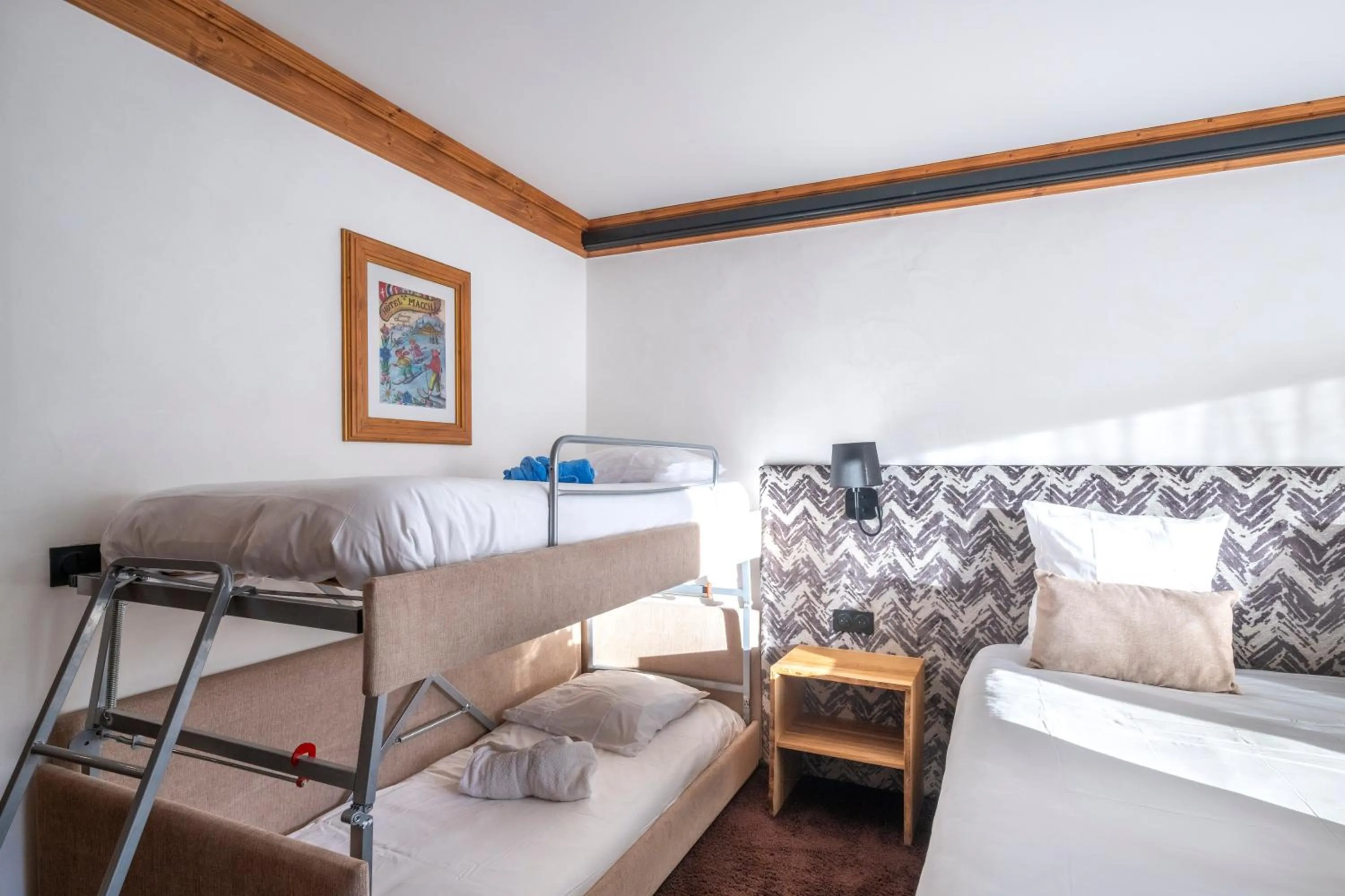 Bed in Hôtel Macchi Restaurant & Spa