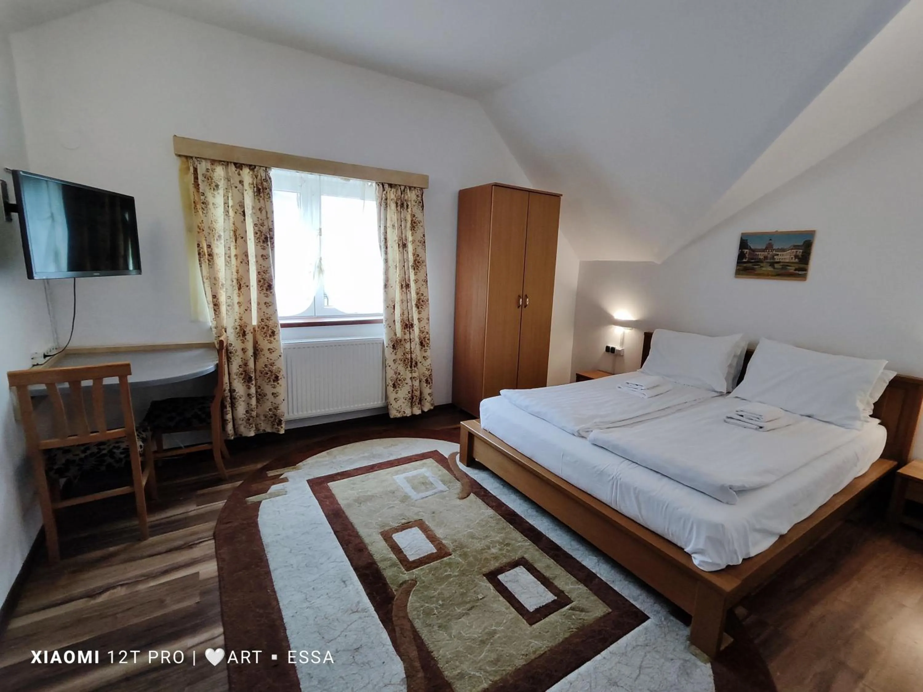 Photo of the whole room, Bed in Pensiunea Buon Gusto Sibiu-motorcyle friendly,city center