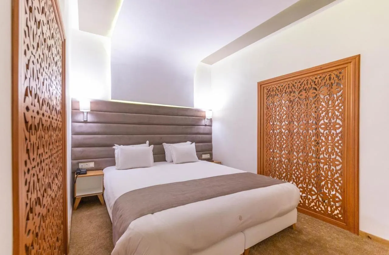 Bed in Hôtel Ibn Batouta