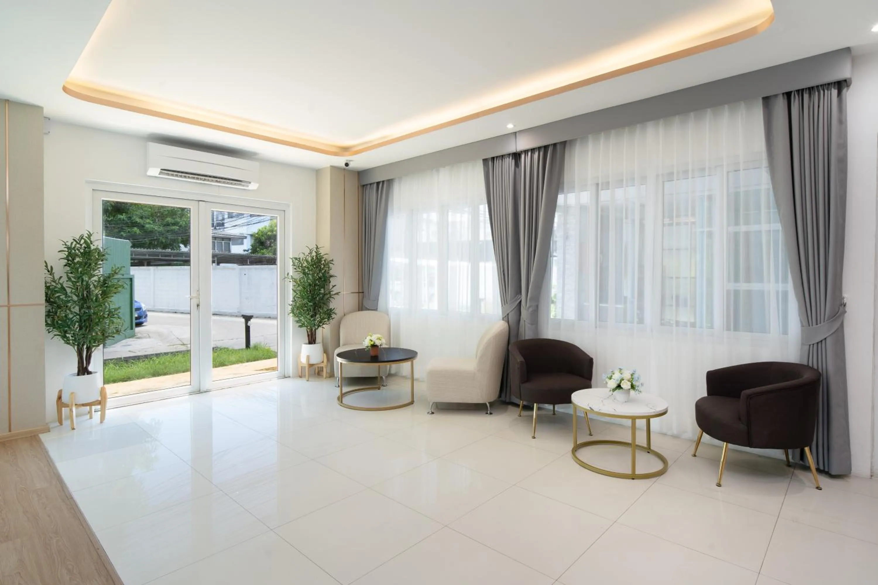 Lobby or reception in Riski Residence Ngamwongwan