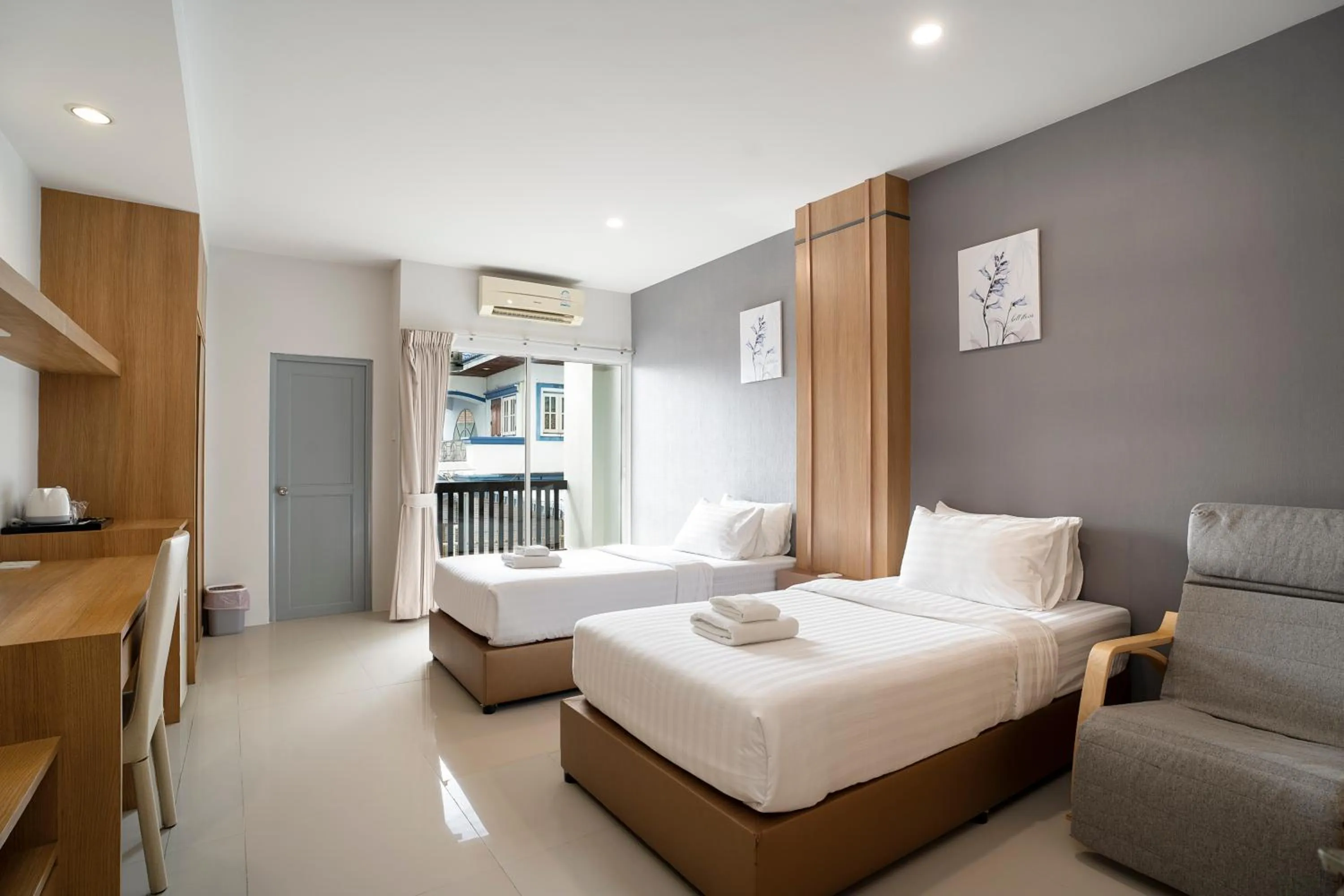 Bed in Riski Residence Ngamwongwan