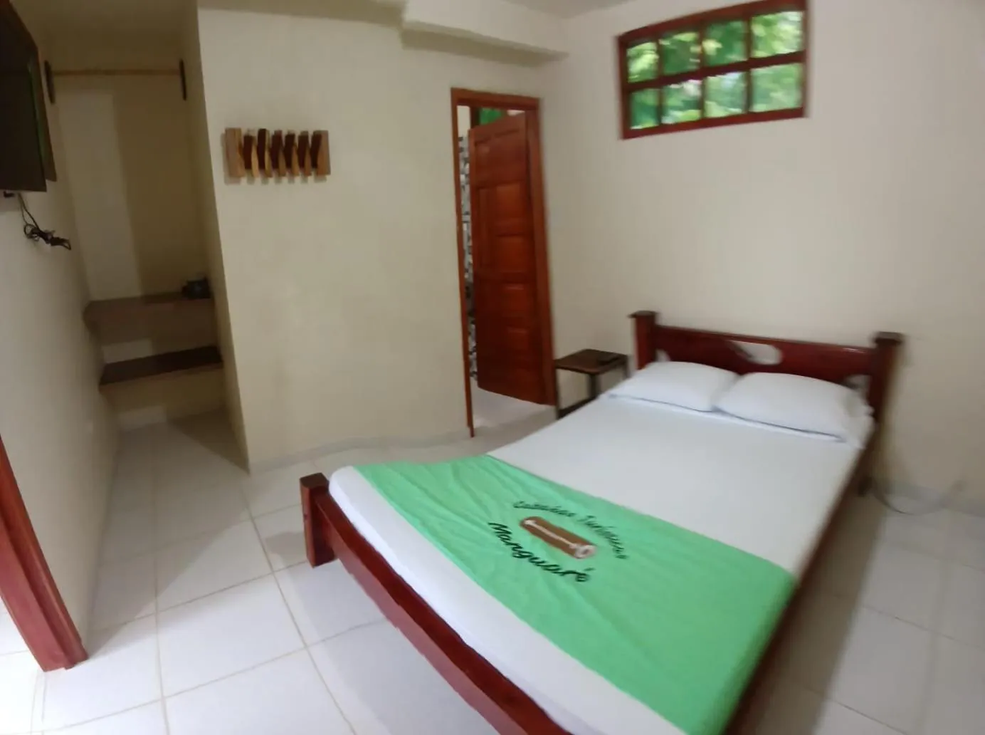Photo of the whole room, Bed in Ecocabañas Manguare
