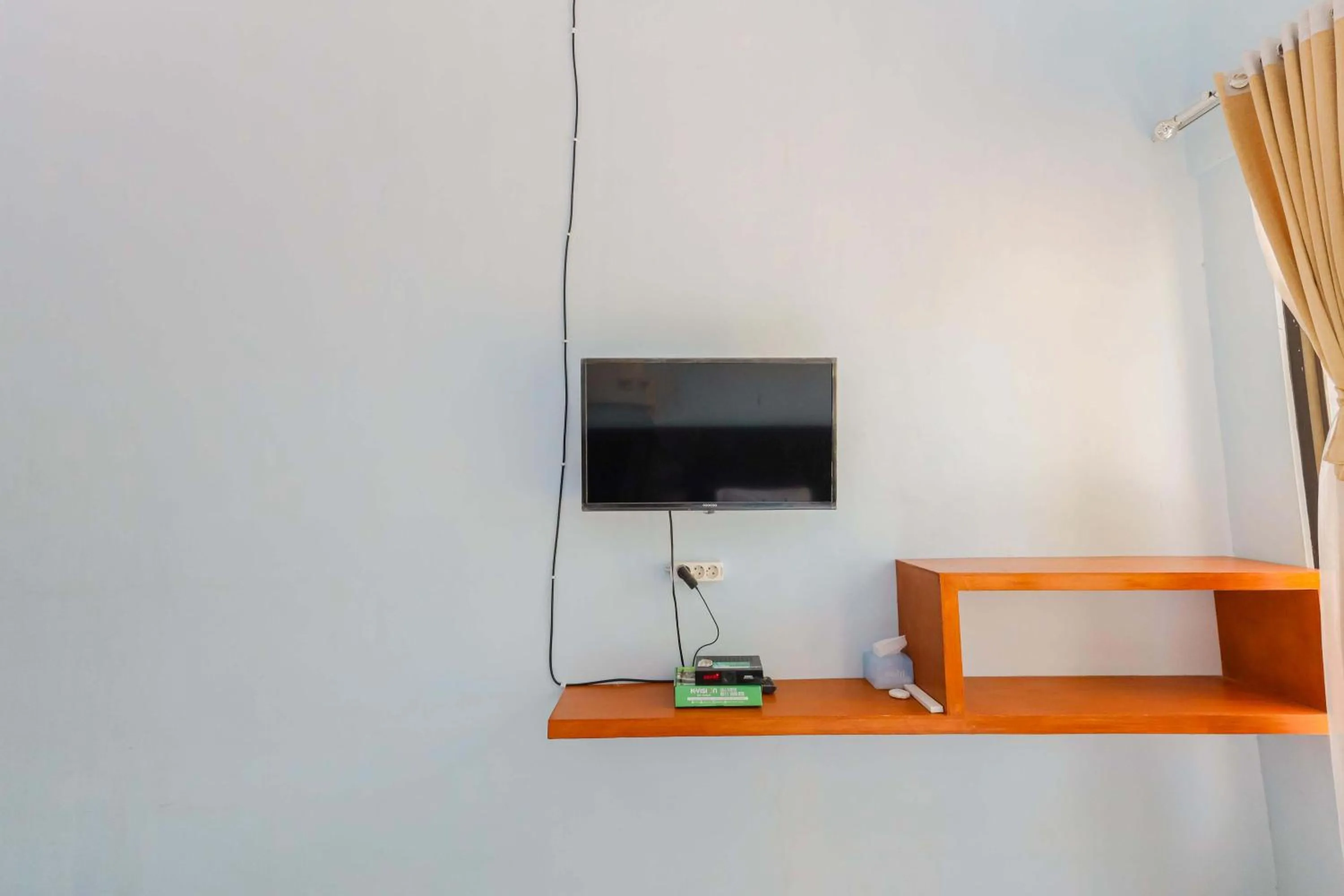 TV and multimedia in Sans Borobudur Homestay Banyuwangi