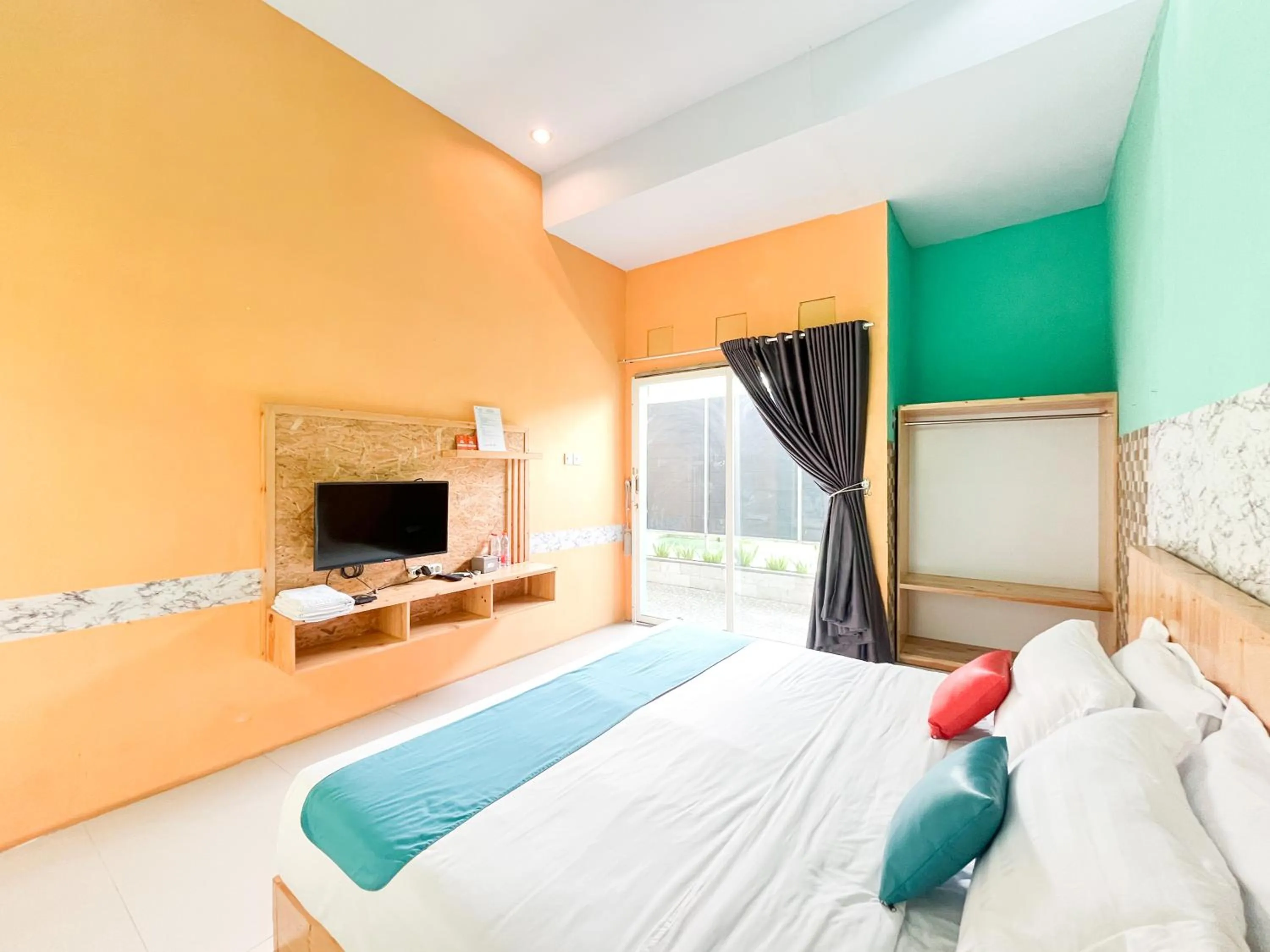 Bedroom, Bed in Sans Borobudur Homestay Banyuwangi