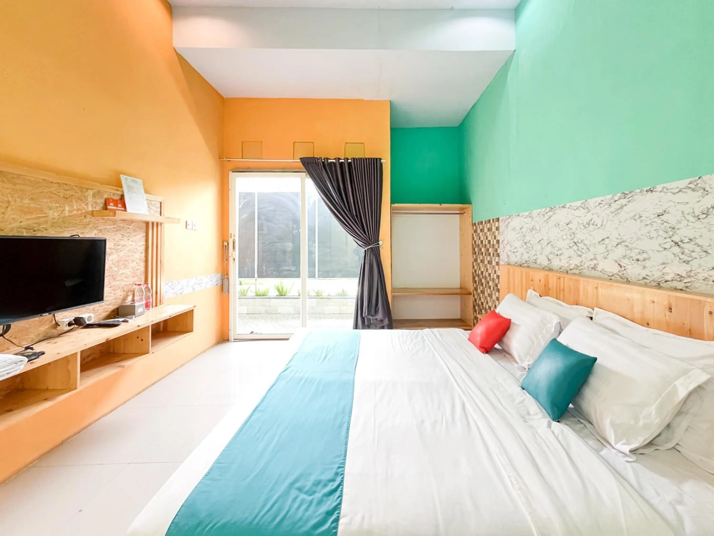 Bedroom, Bed in Sans Borobudur Homestay Banyuwangi