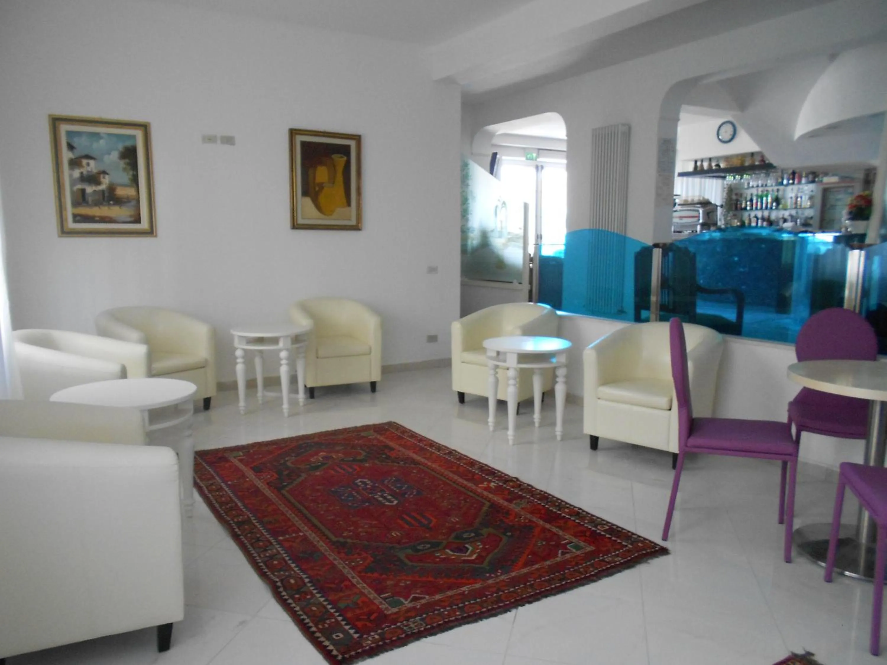 Communal lounge/ TV room in Hotel Laguna Blu