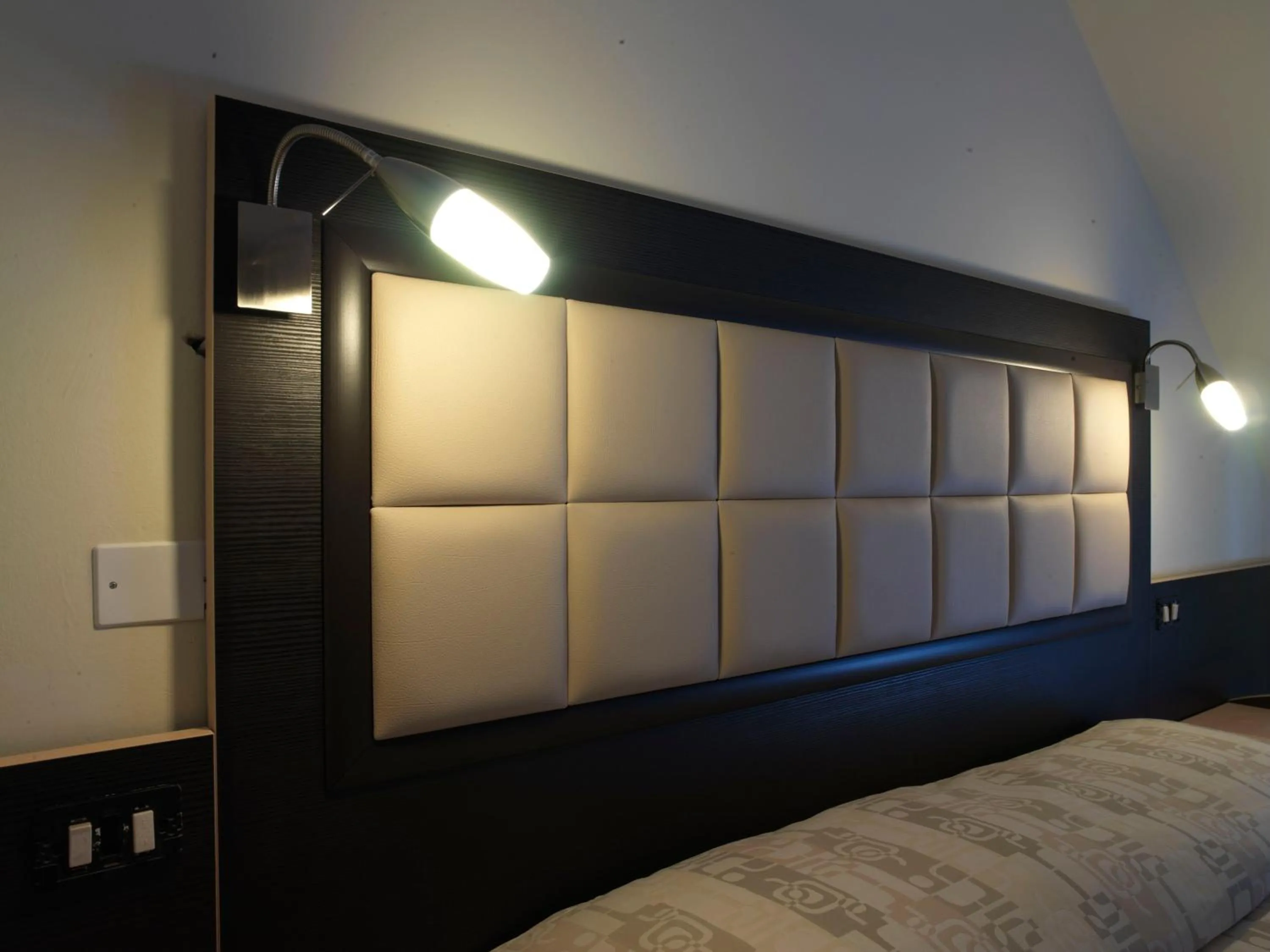 Decorative detail, Bed in Hotel Arno