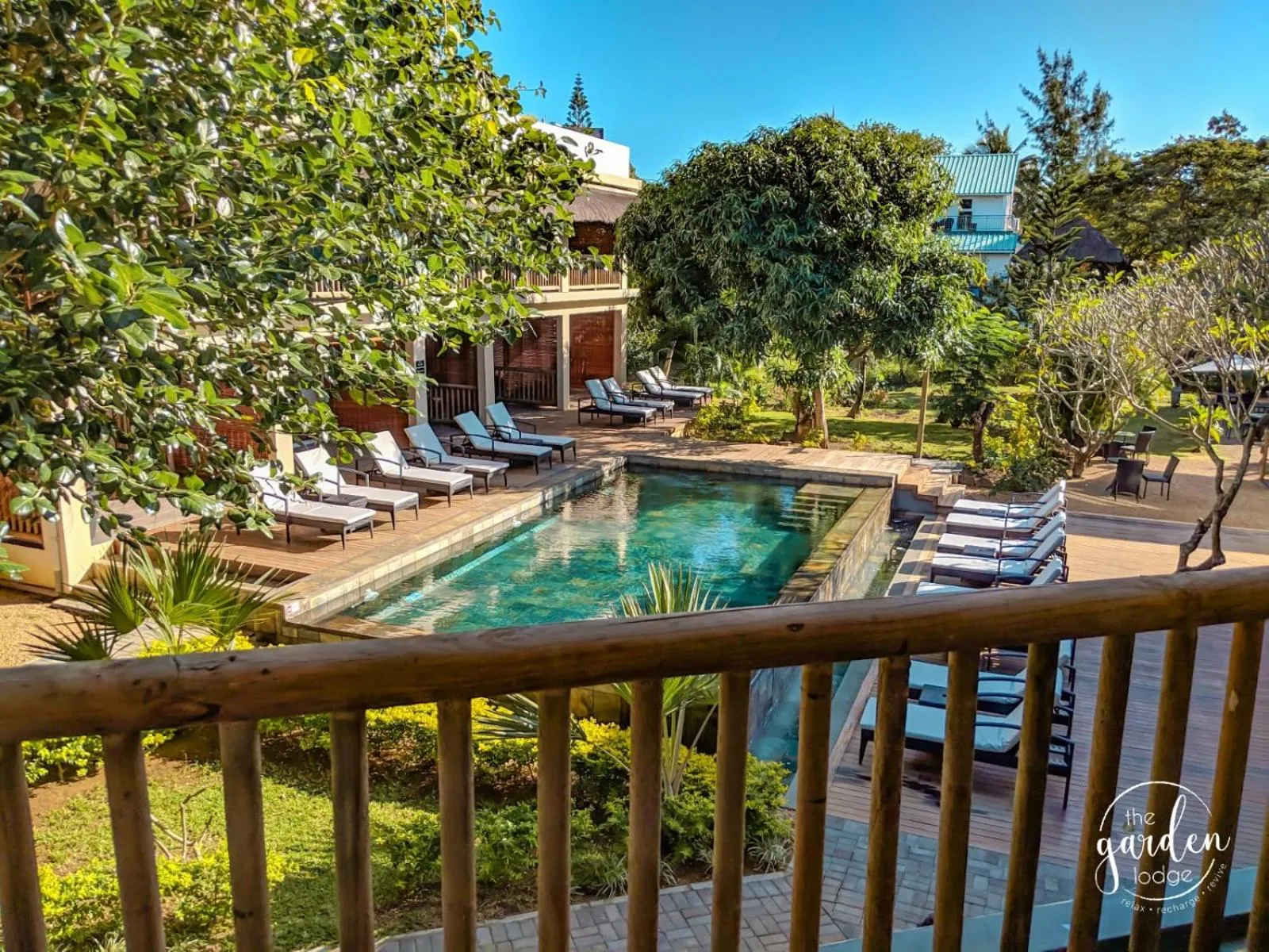 Patio in The Garden Lodge Pereybere - Piscine & Jardin