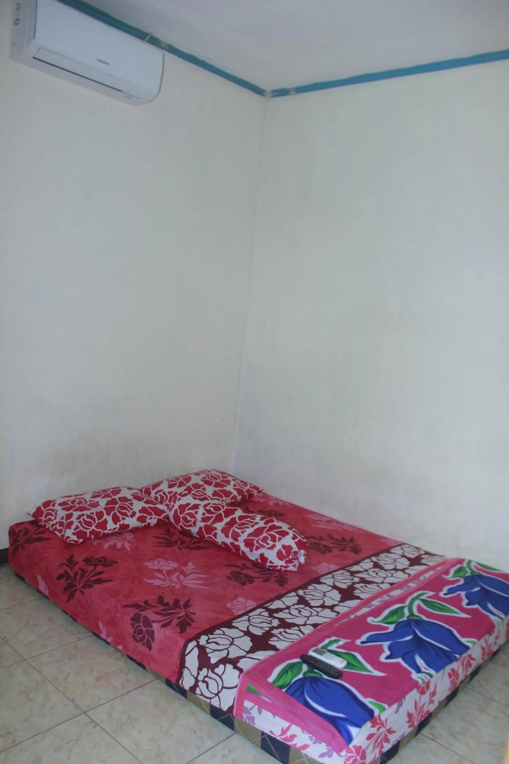 Bed in Penginapan Putra Darma