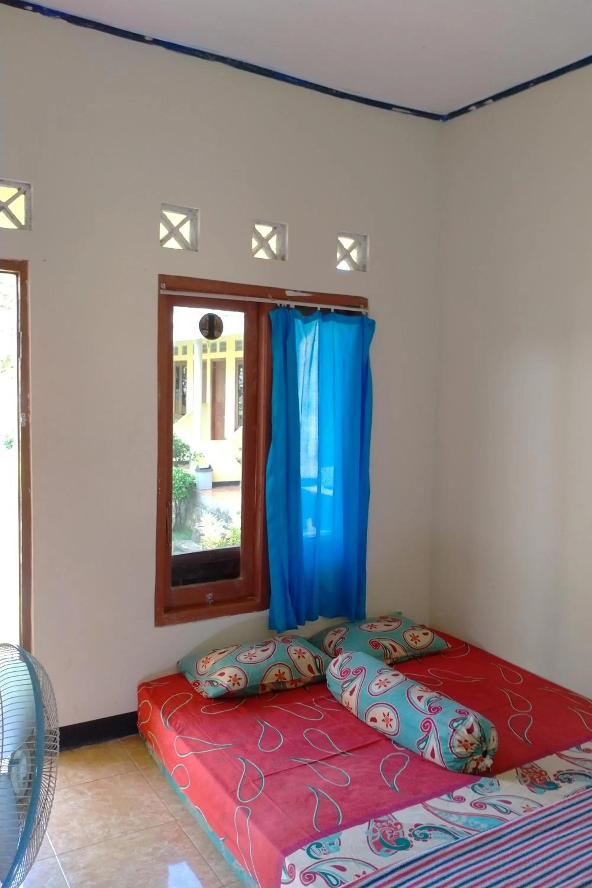 Bed in Penginapan Putra Darma