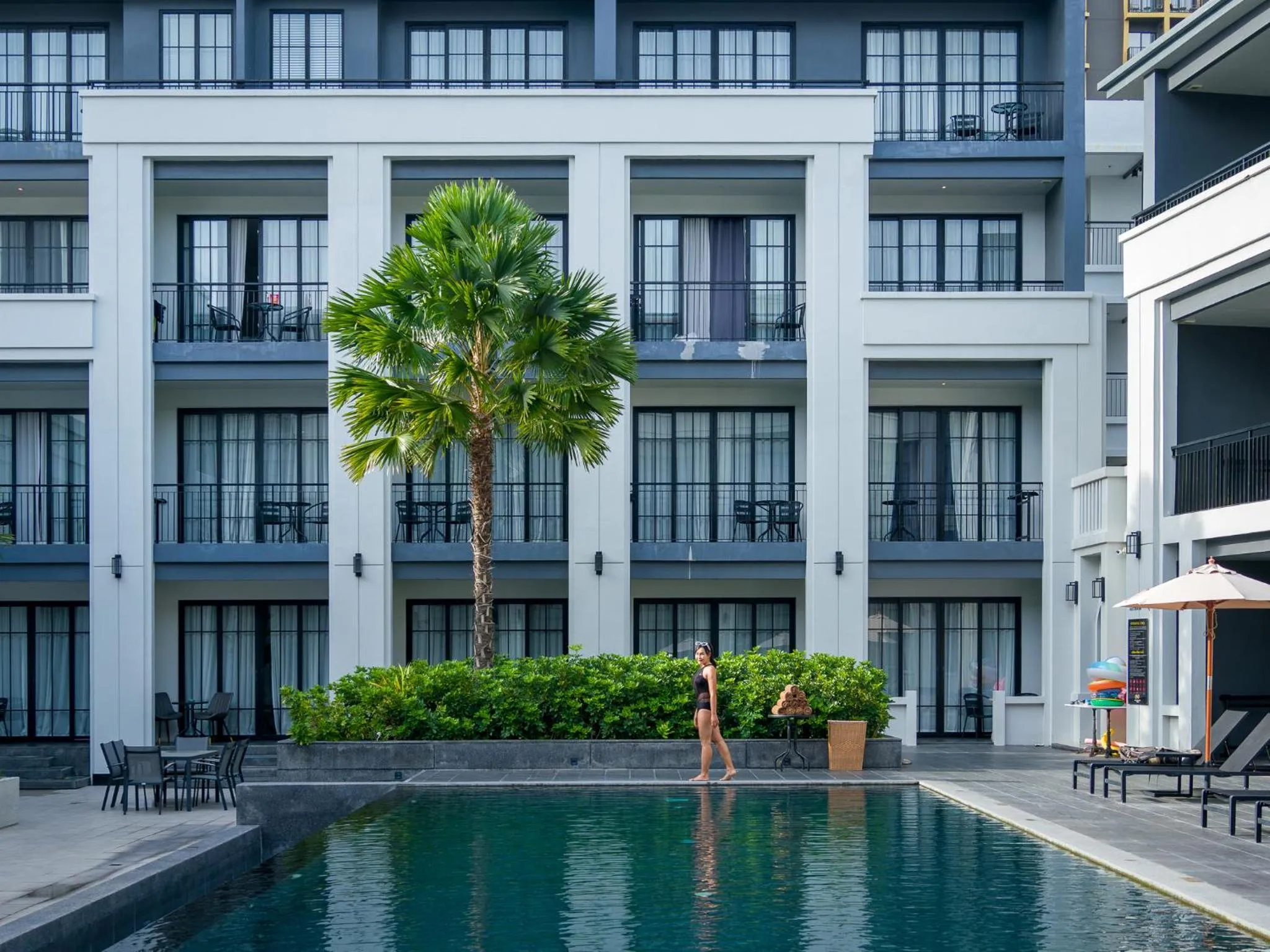 Swimming pool in One Patio Hotel Pattaya - SHA Extra Plus