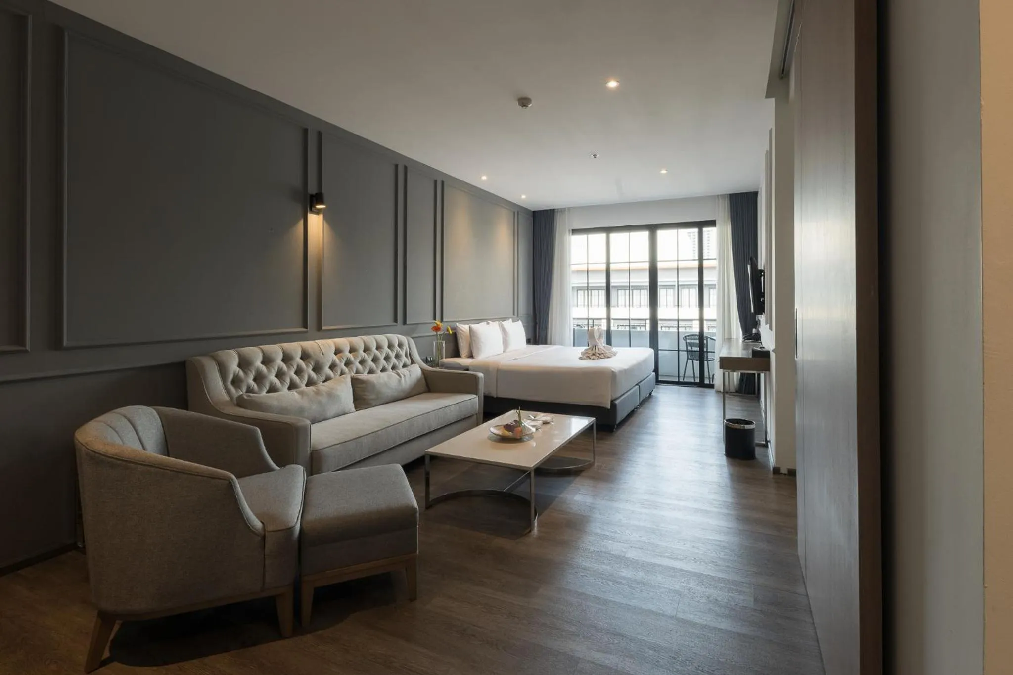 Living room in One Patio Hotel Pattaya - SHA Extra Plus