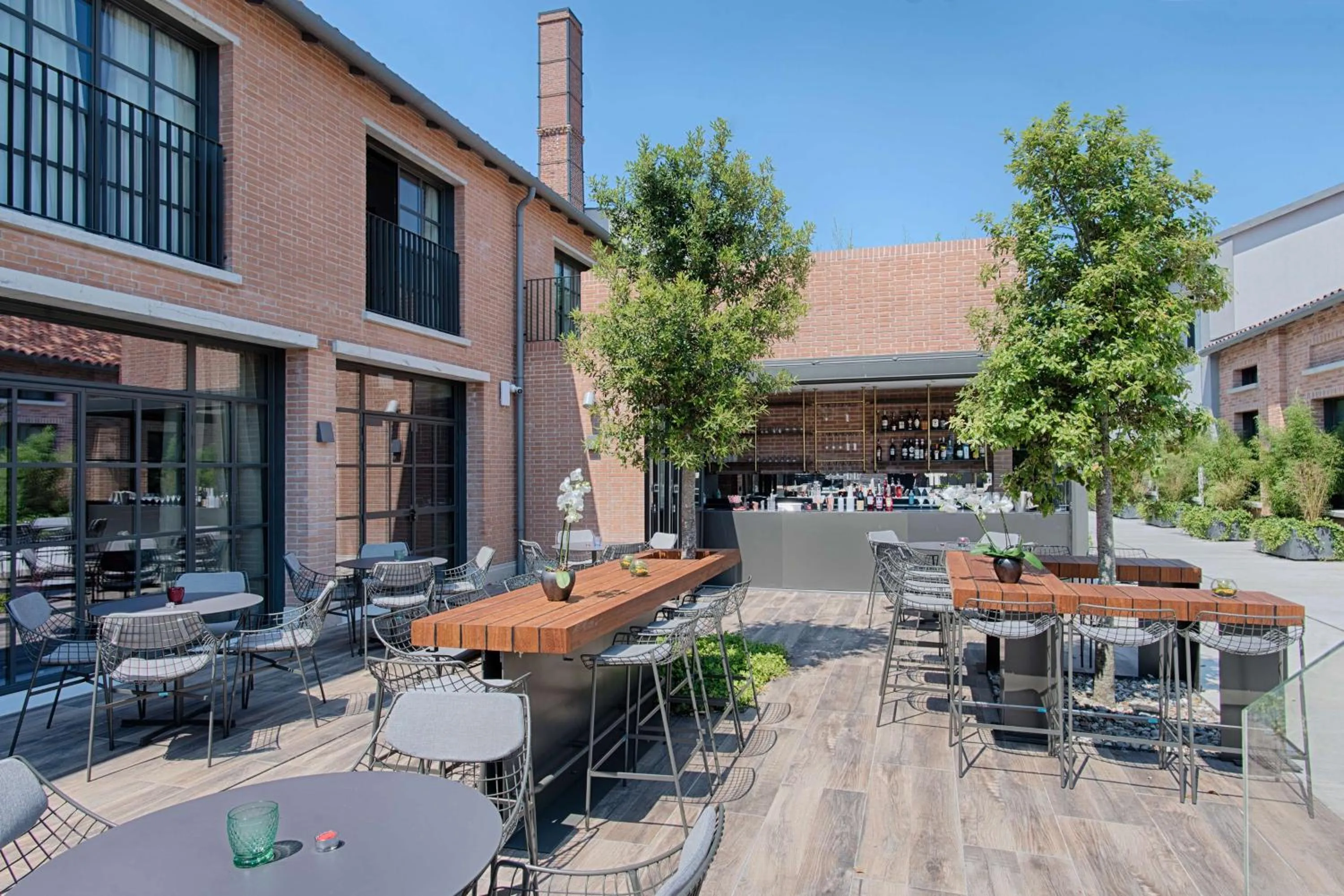 Patio in NH Collection Murano Villa