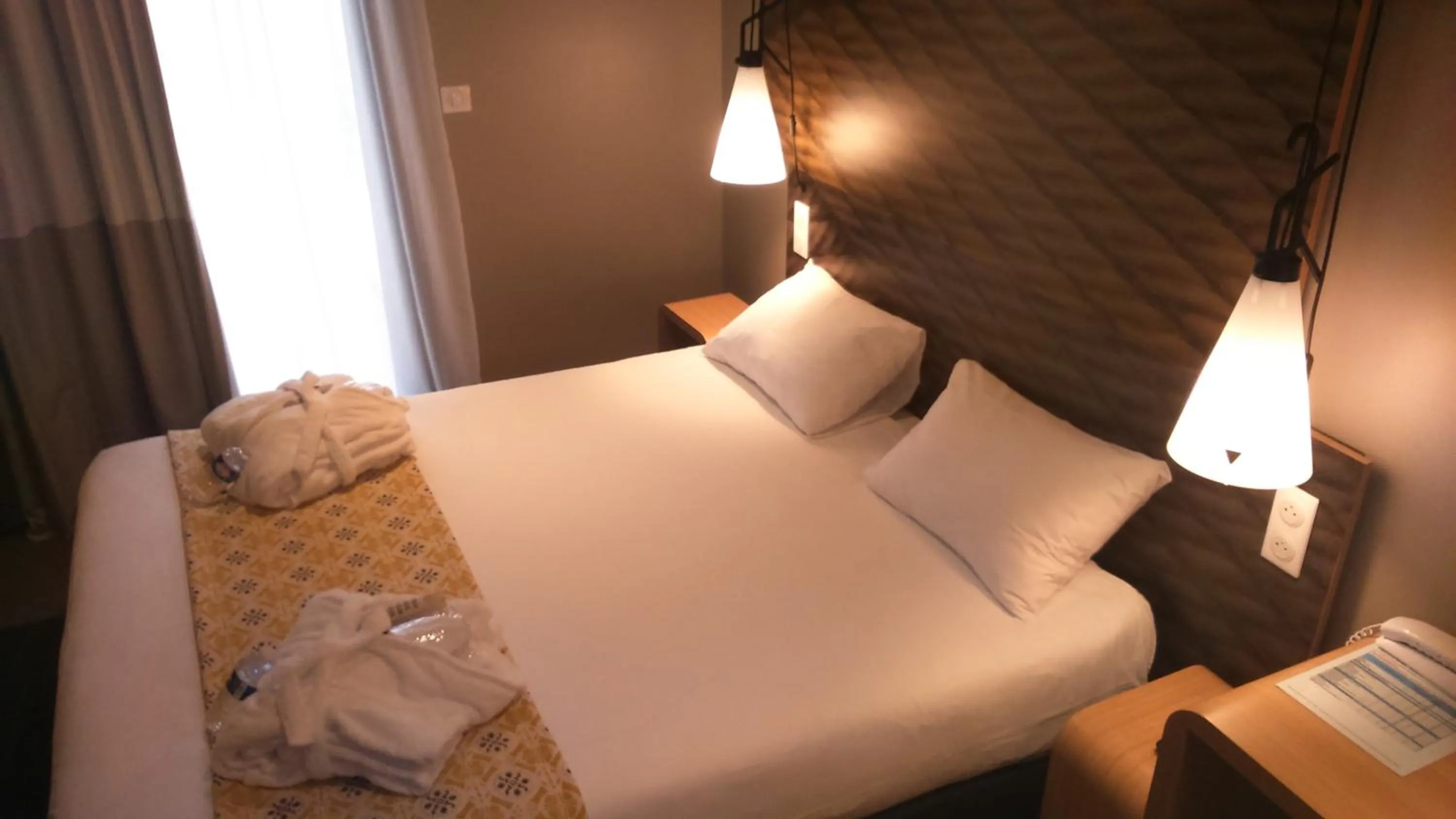 Decorative detail, Bed in ibis Saint-Malo Madeleine