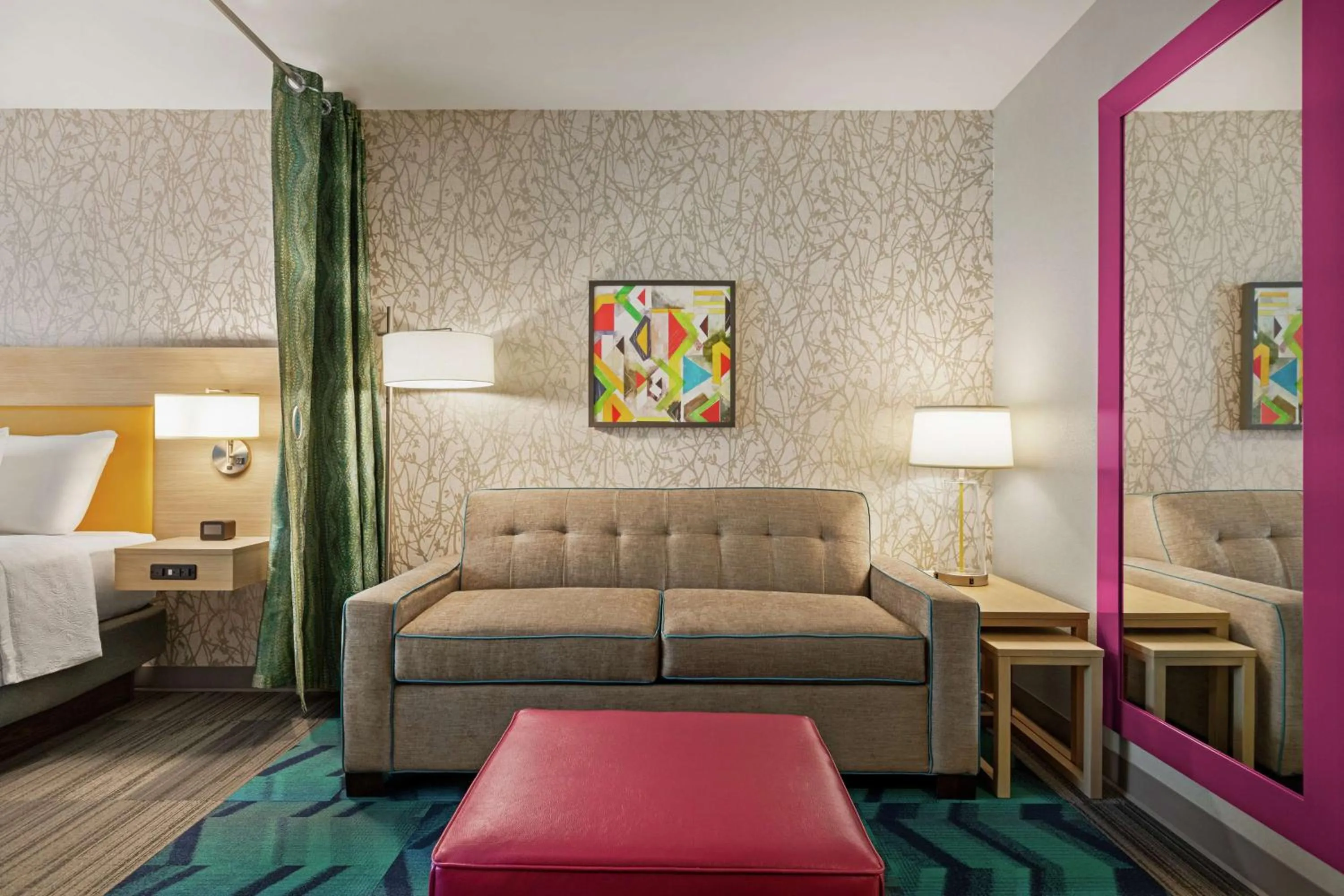 Living room, Bed in Home2 Suites By Hilton Fernandina Beach on Amelia Island, FL