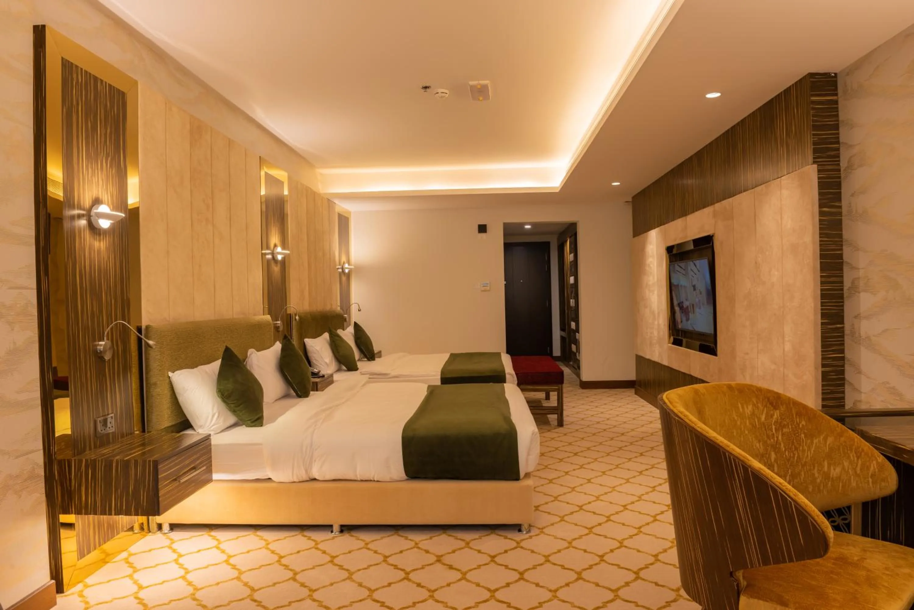 Bed in Royal Crown Hotel