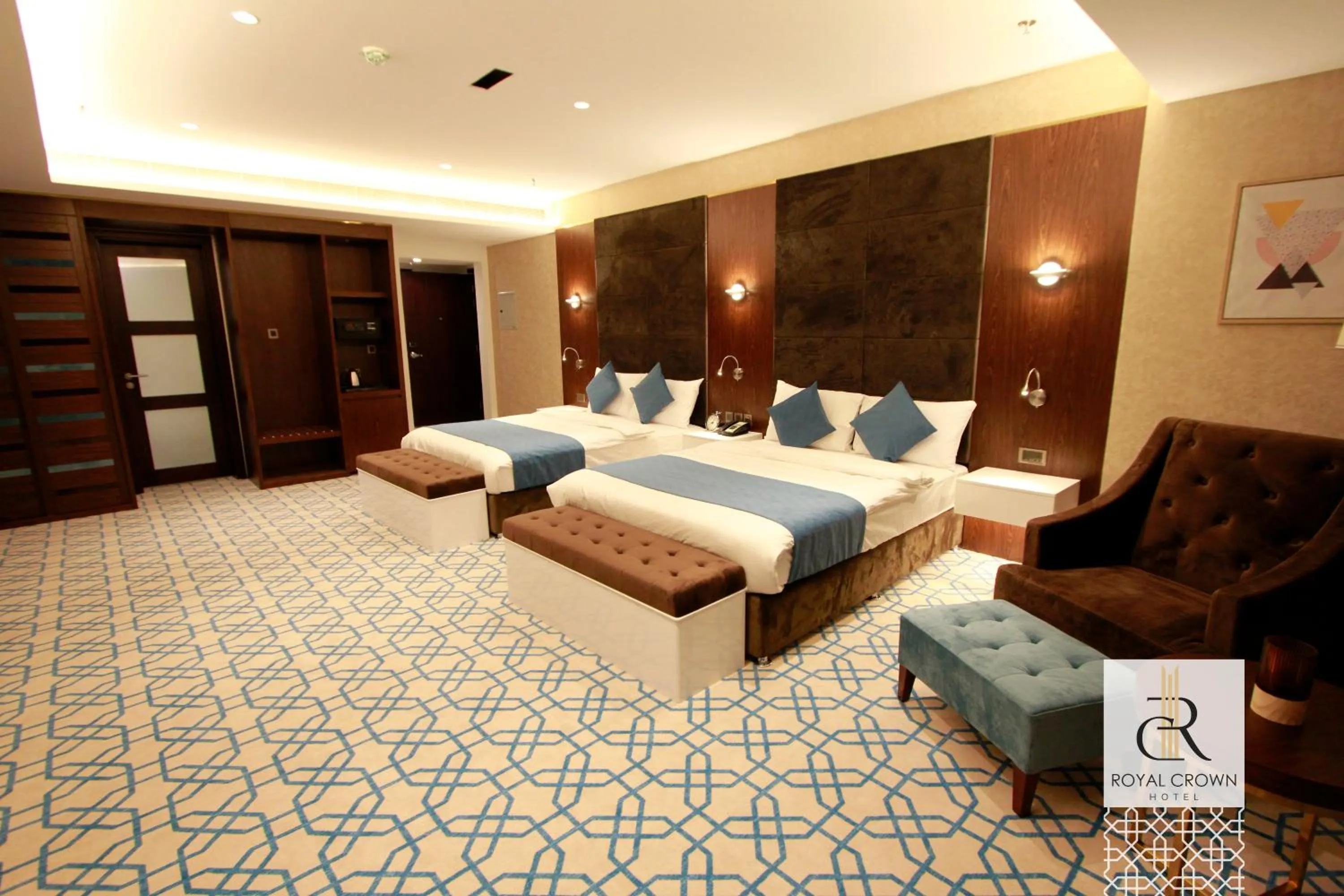 Bed in Royal Crown Hotel