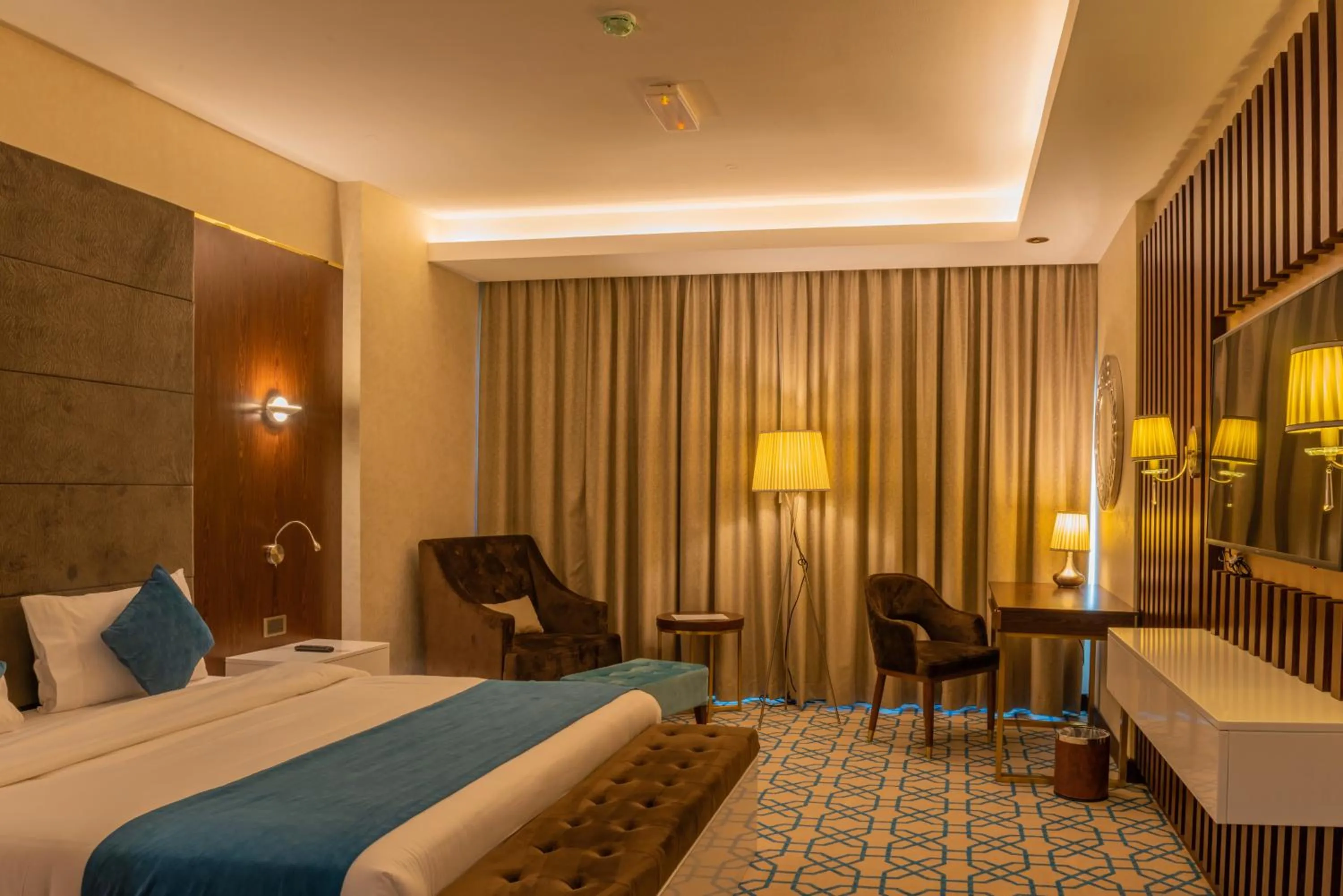 Bed in Royal Crown Hotel