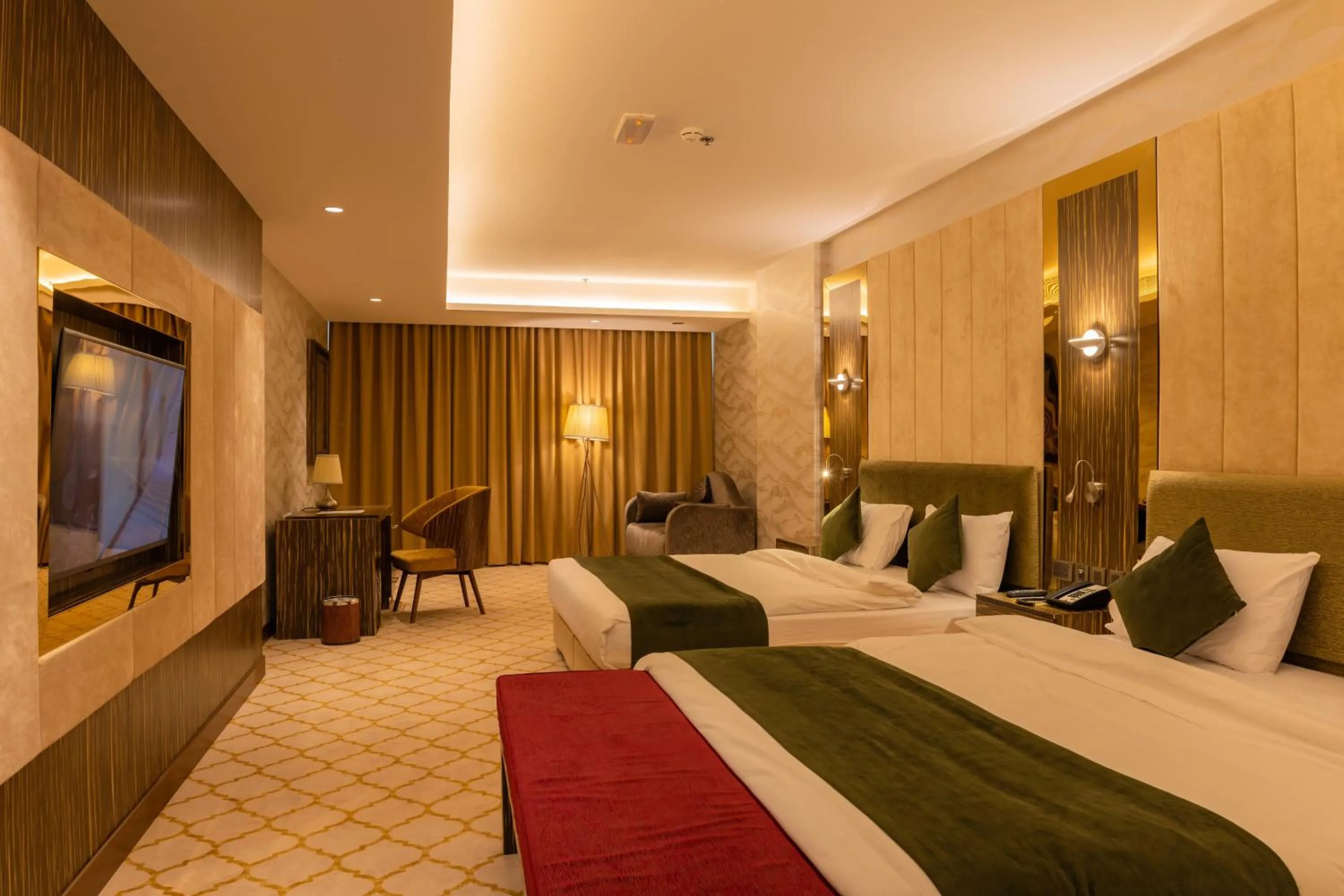 Bed in Royal Crown Hotel