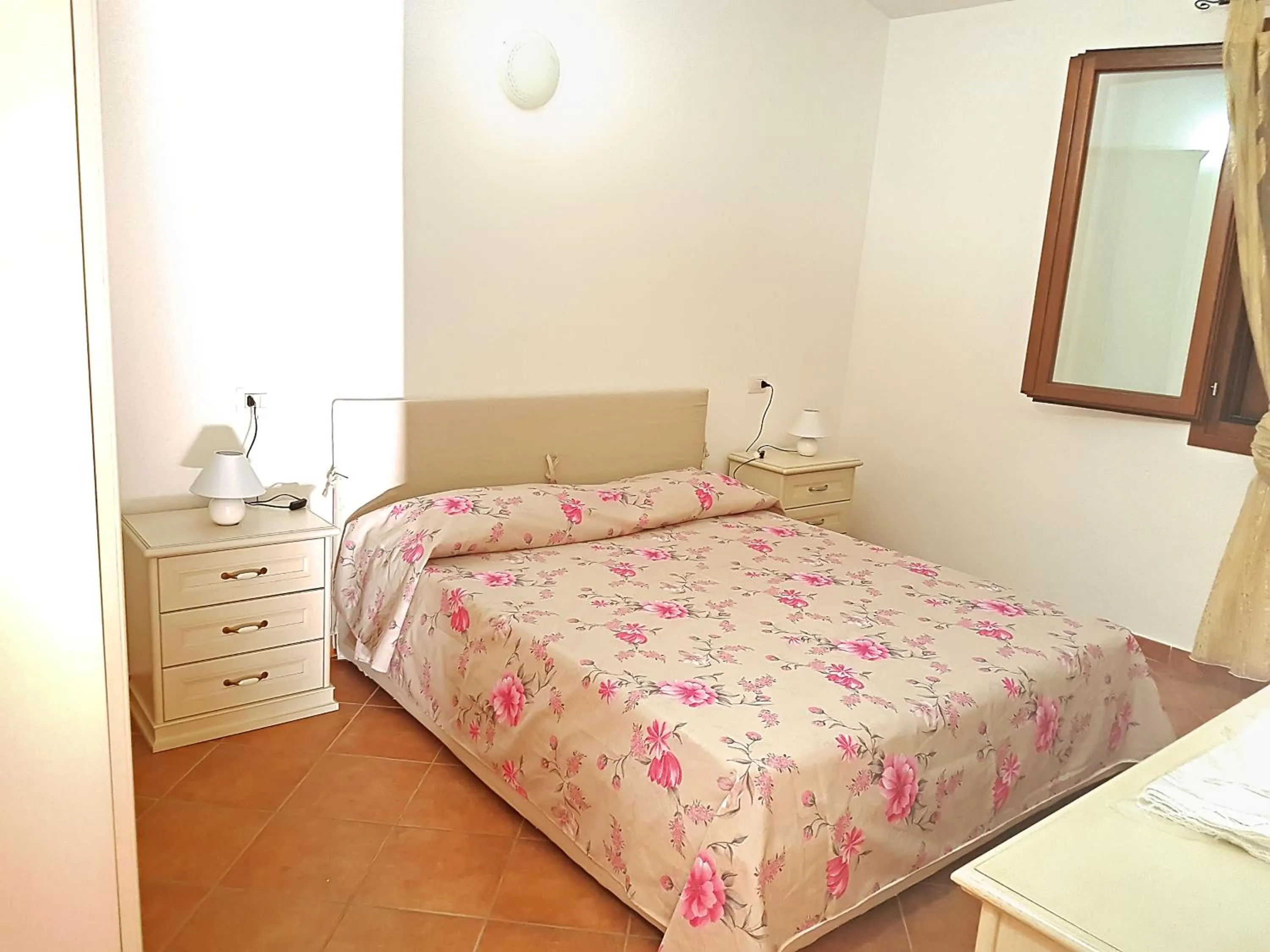 Bed in Appartamenti Tanaunella