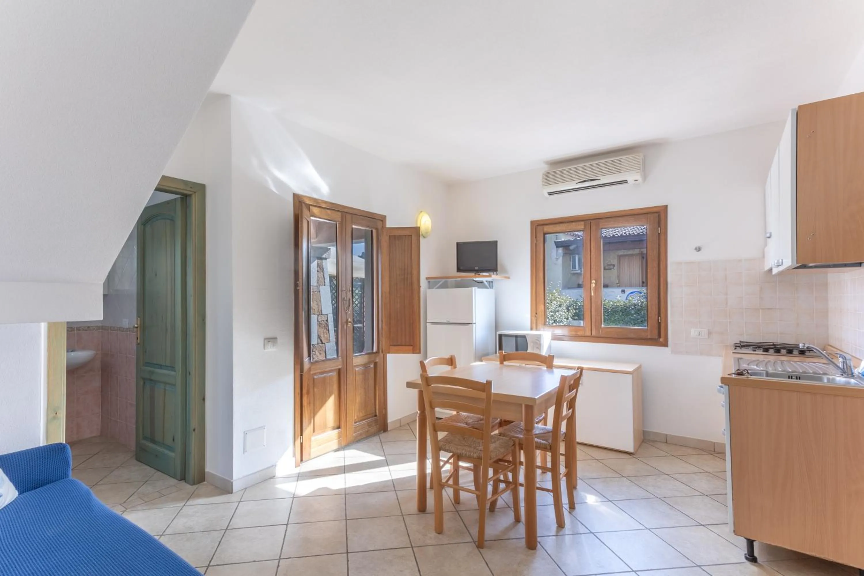 Dining area in Appartamenti Tanaunella