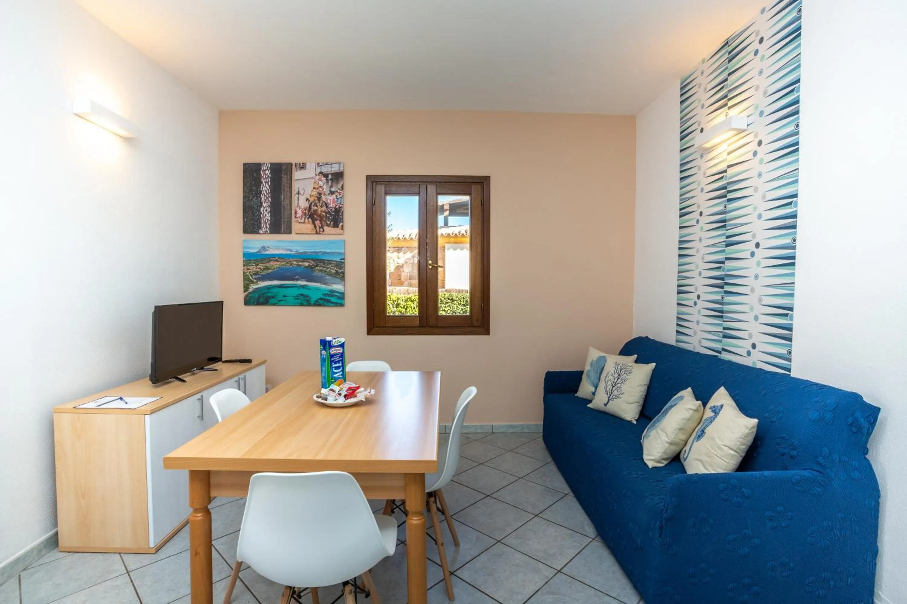 Dining area in Appartamenti Tanaunella