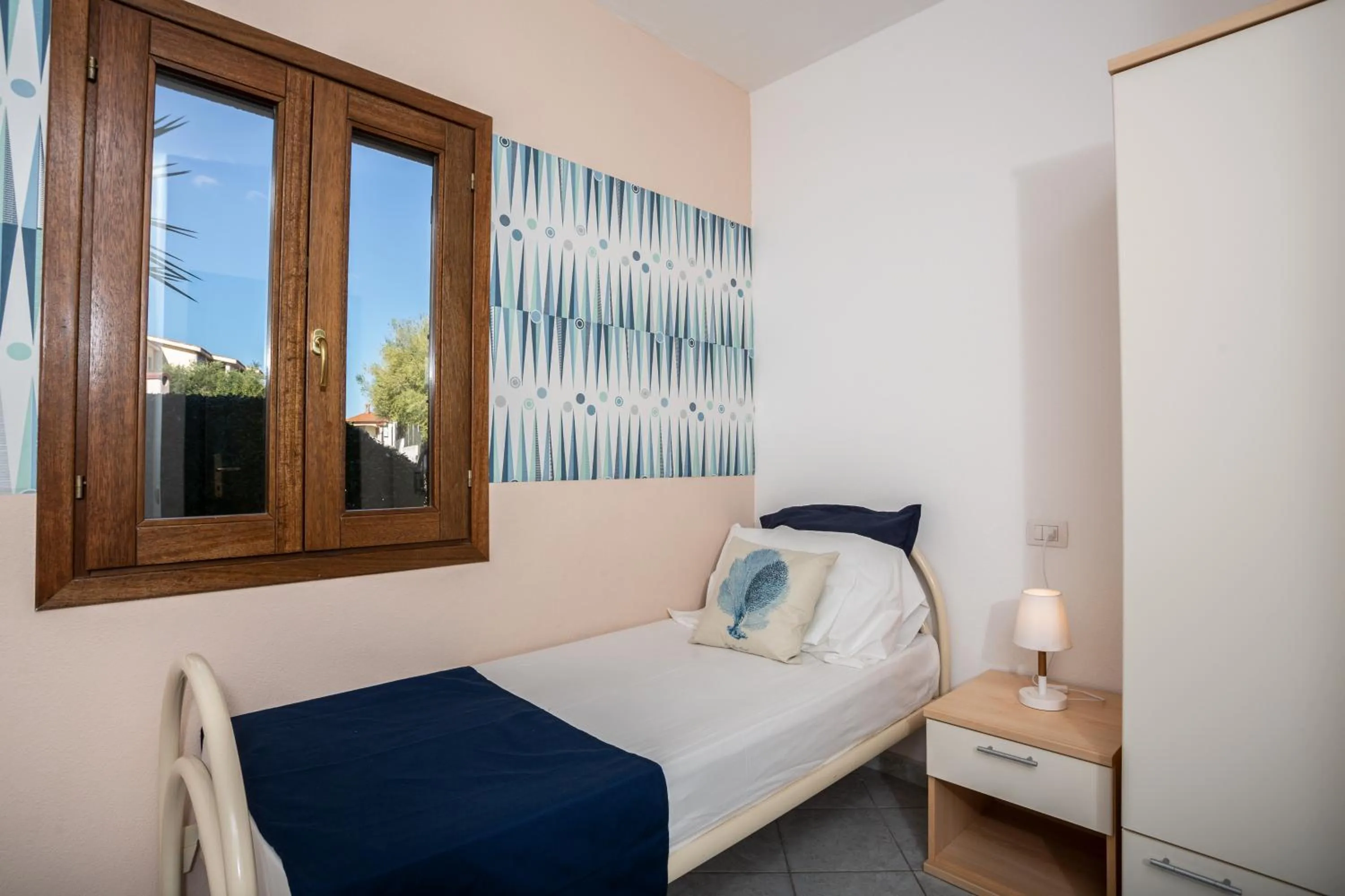 Bedroom in Appartamenti Tanaunella