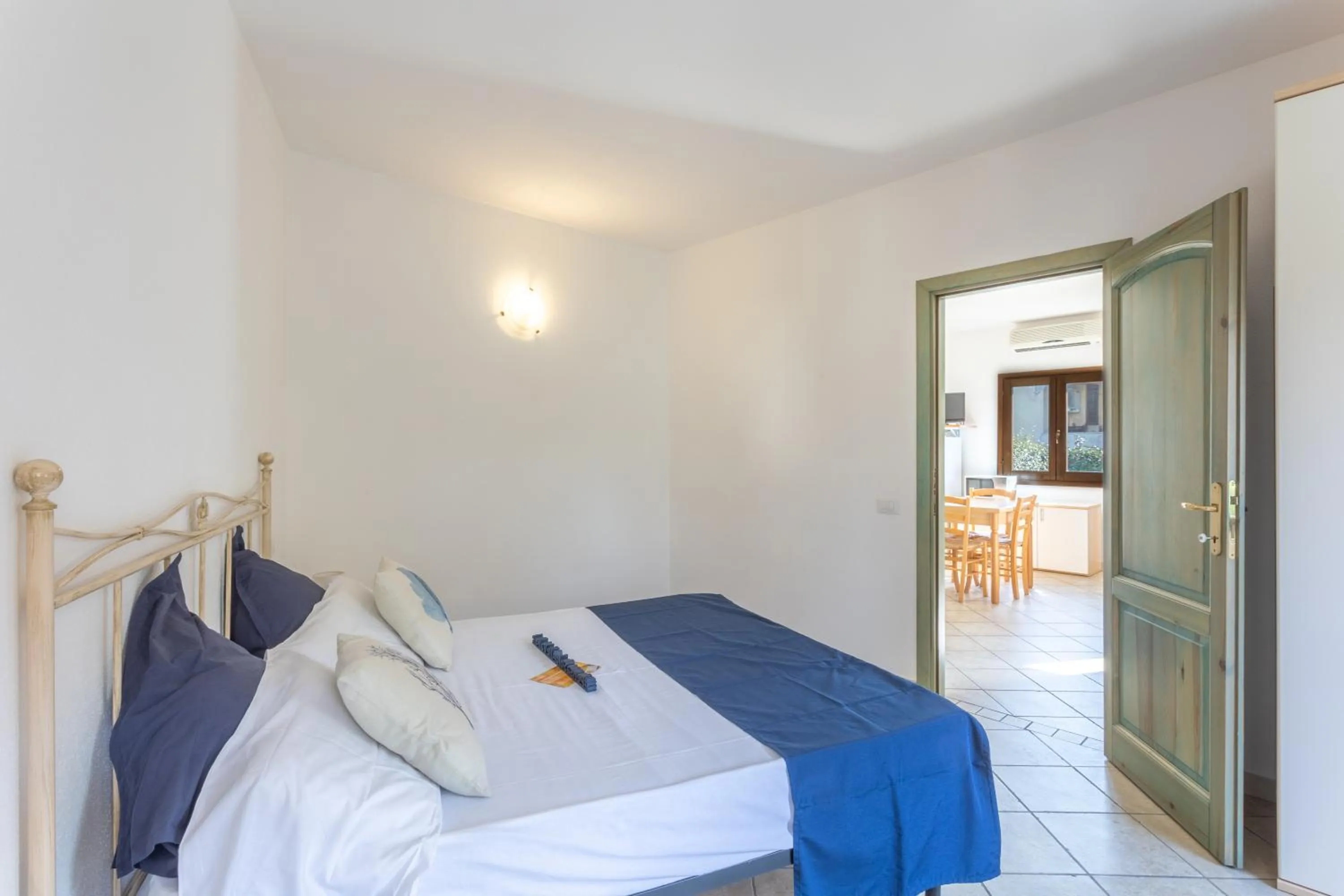 Bedroom in Appartamenti Tanaunella