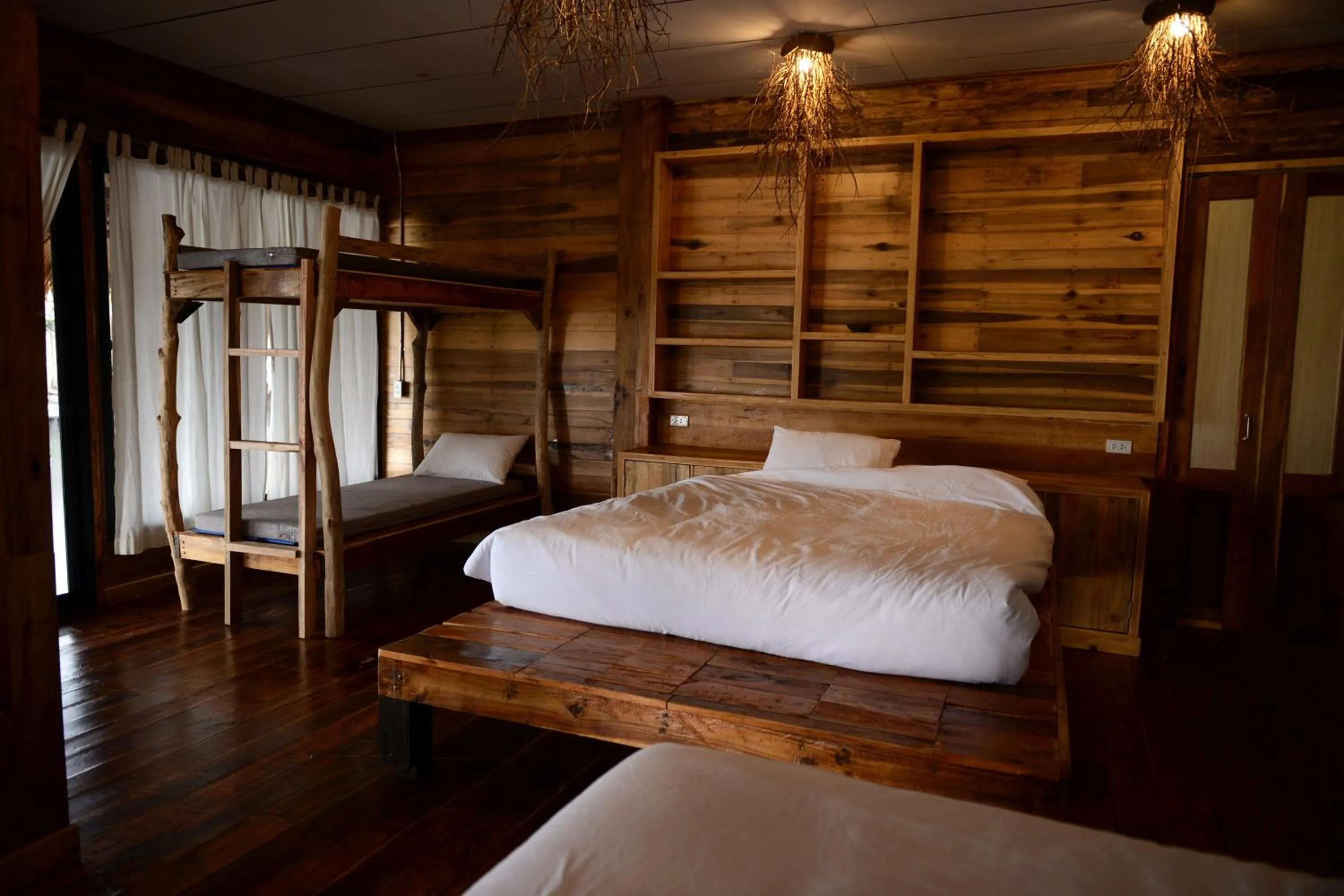 Bed in Baan​ Tonlamphu​ Pakpra