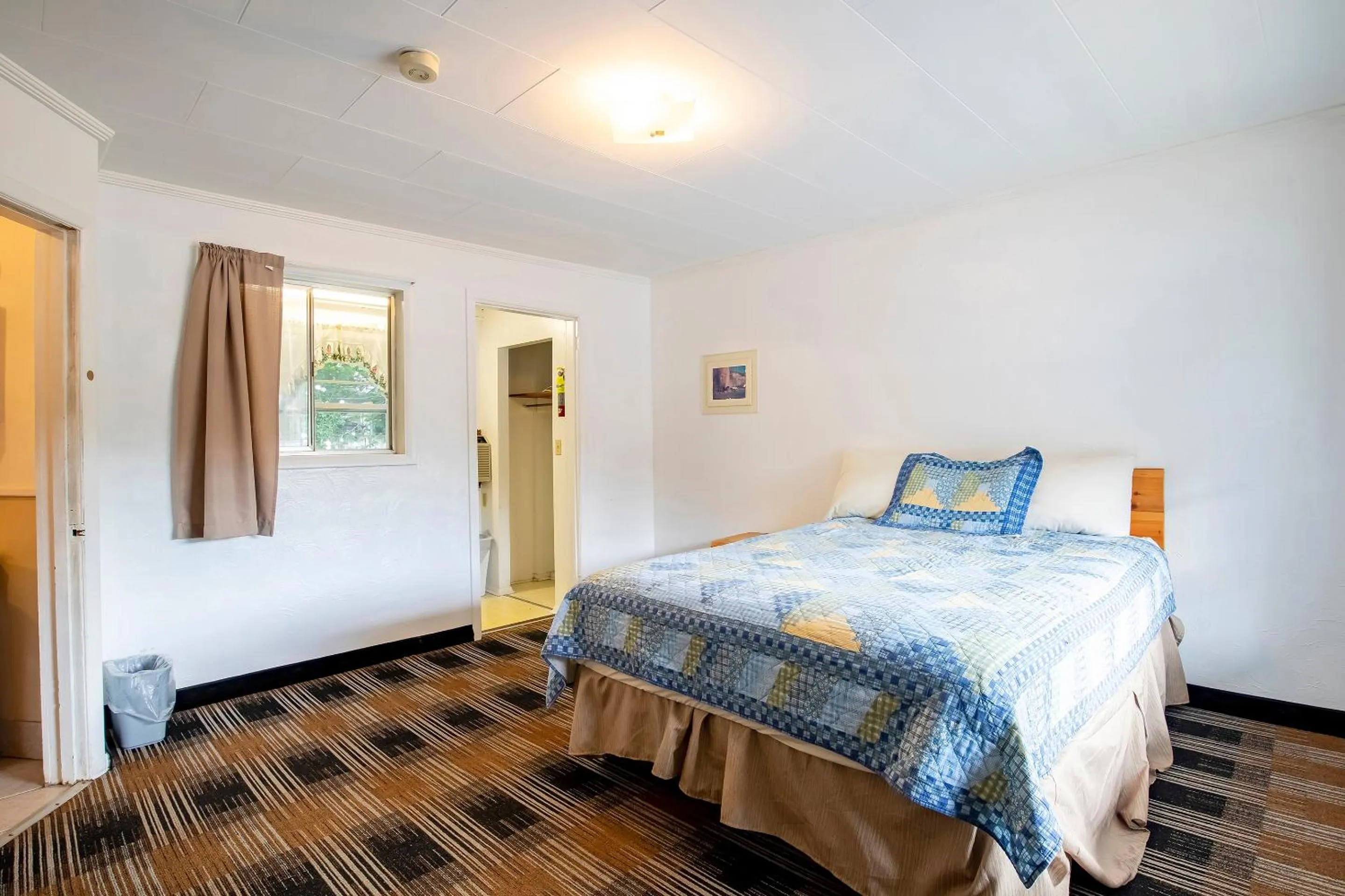 Bedroom, Bed in Lloyd's On The River Country Inn By Oyo