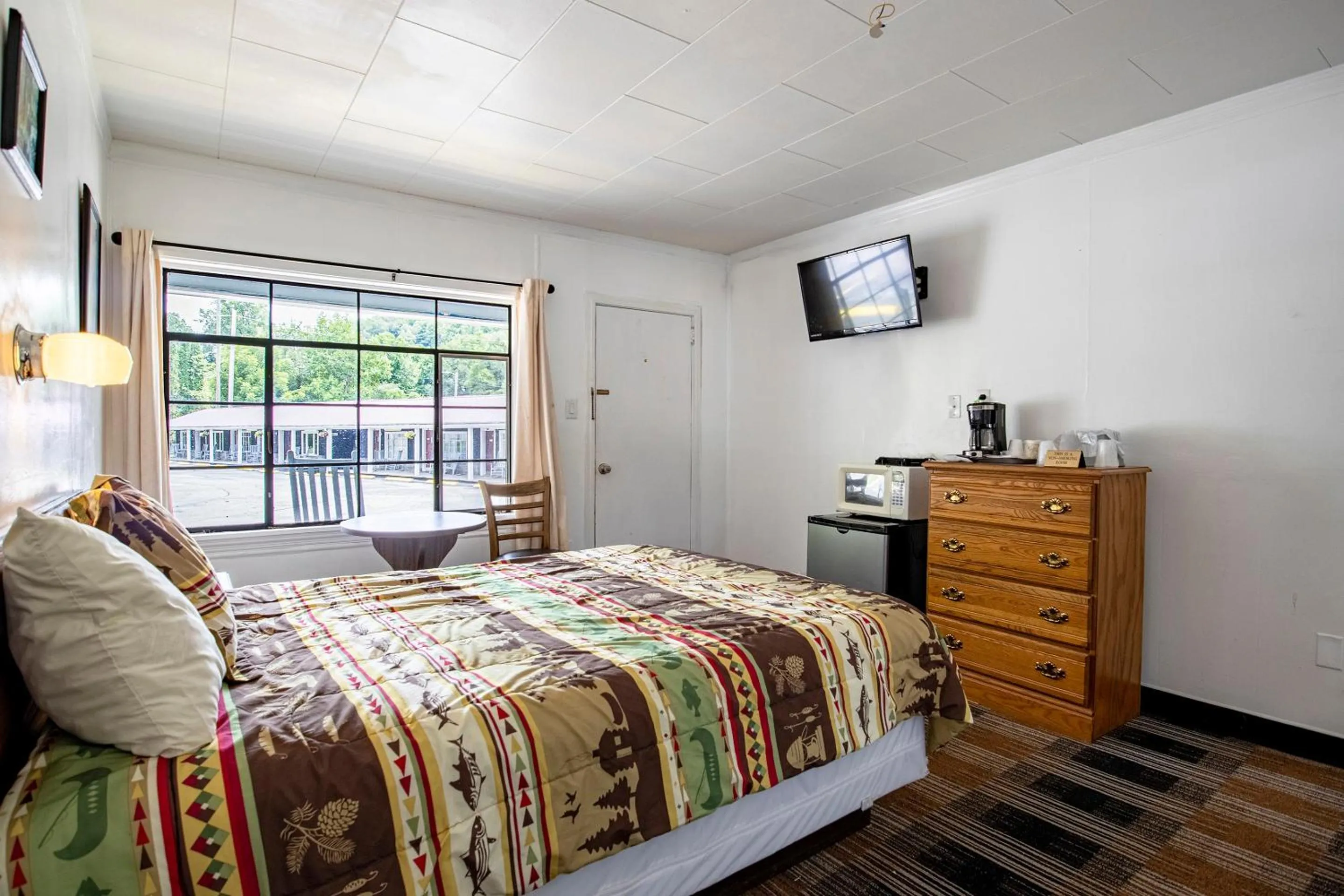 Bedroom, Bed in Lloyd's On The River Country Inn By Oyo