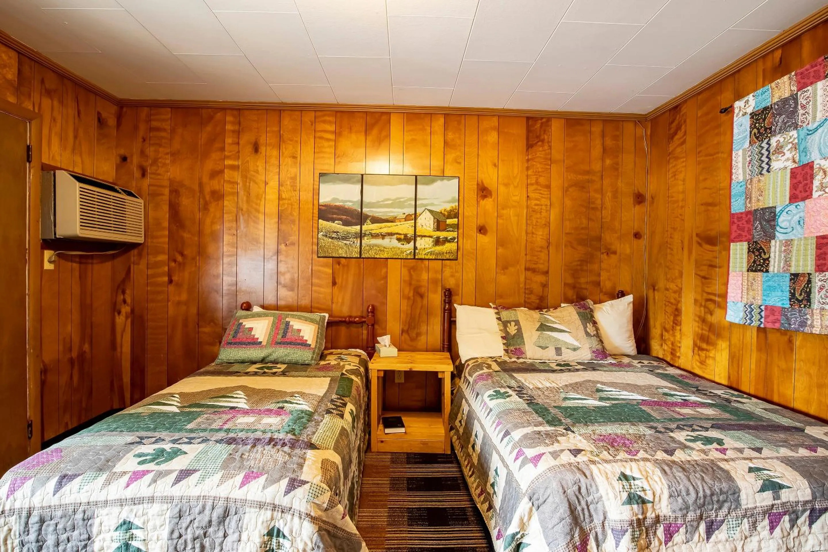 Bedroom, Bed in Lloyd's On The River Country Inn By Oyo