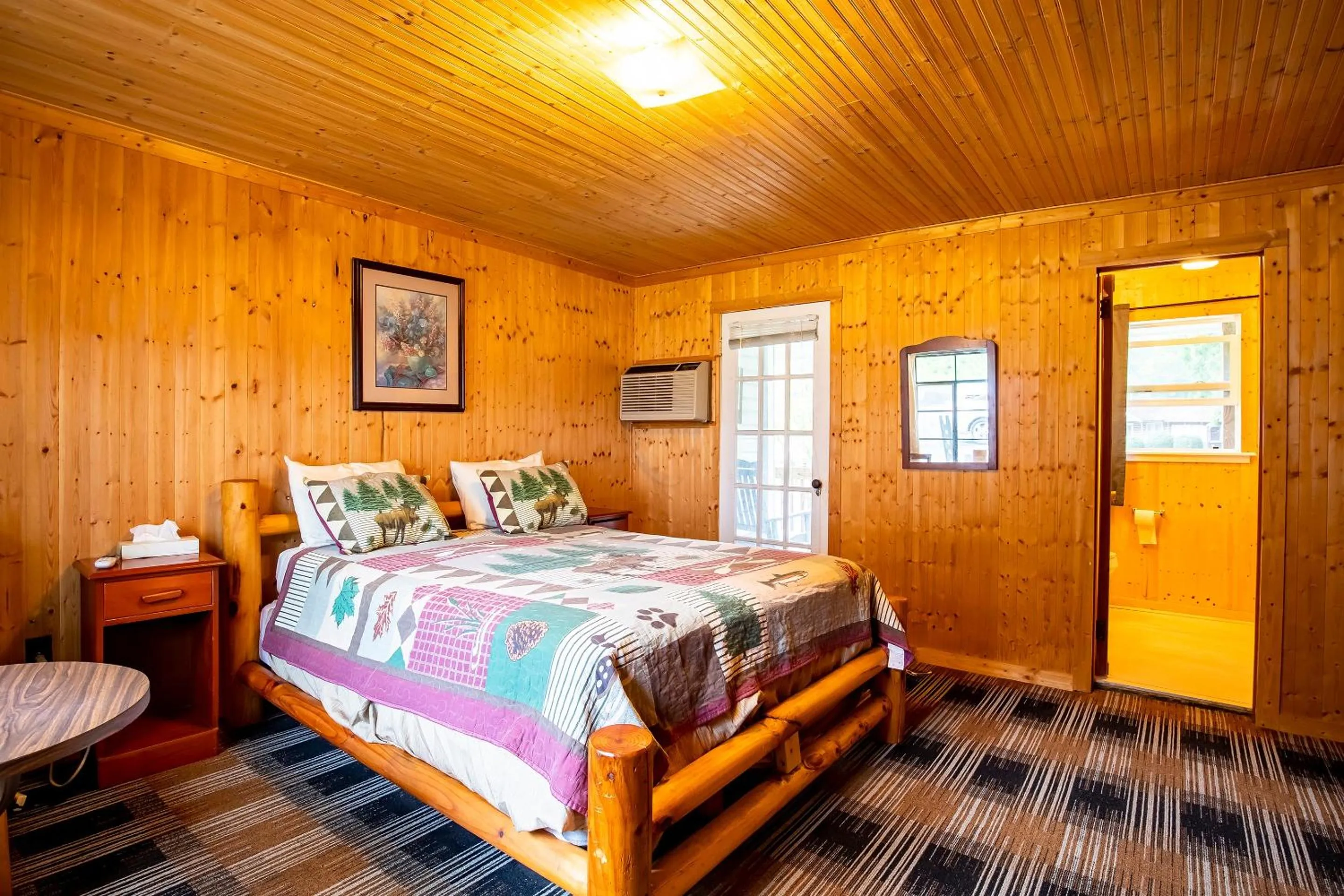 Bedroom, Bed in Lloyd's On The River Country Inn By Oyo