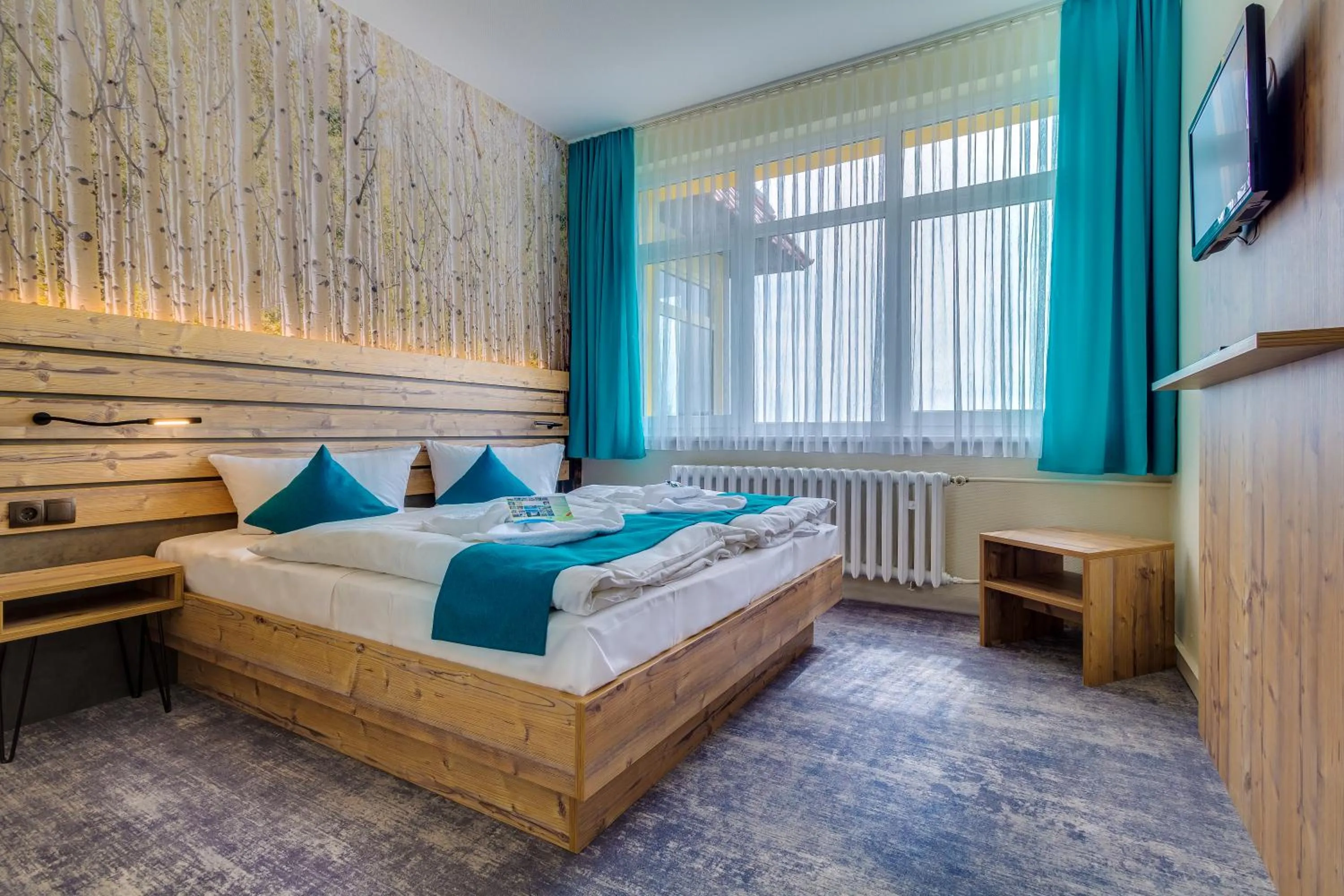 Photo of the whole room, Bed in Panorama Ferien Hotel Harz