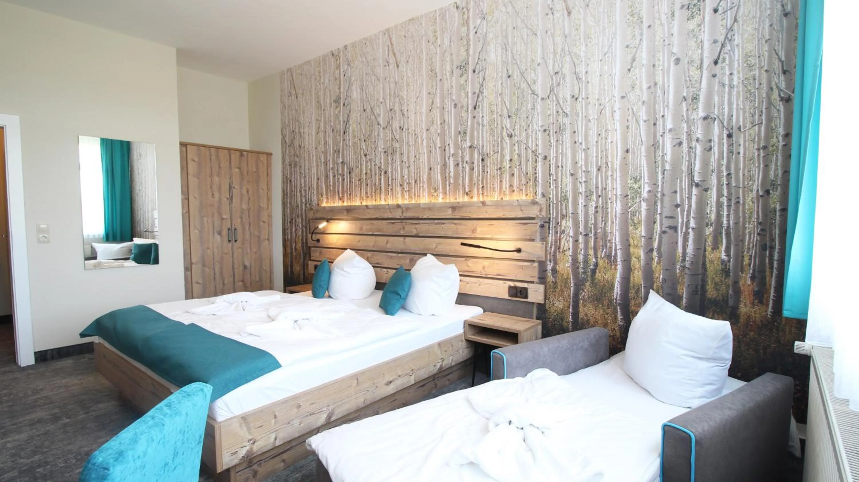Photo of the whole room, Bed in Panorama Ferien Hotel Harz