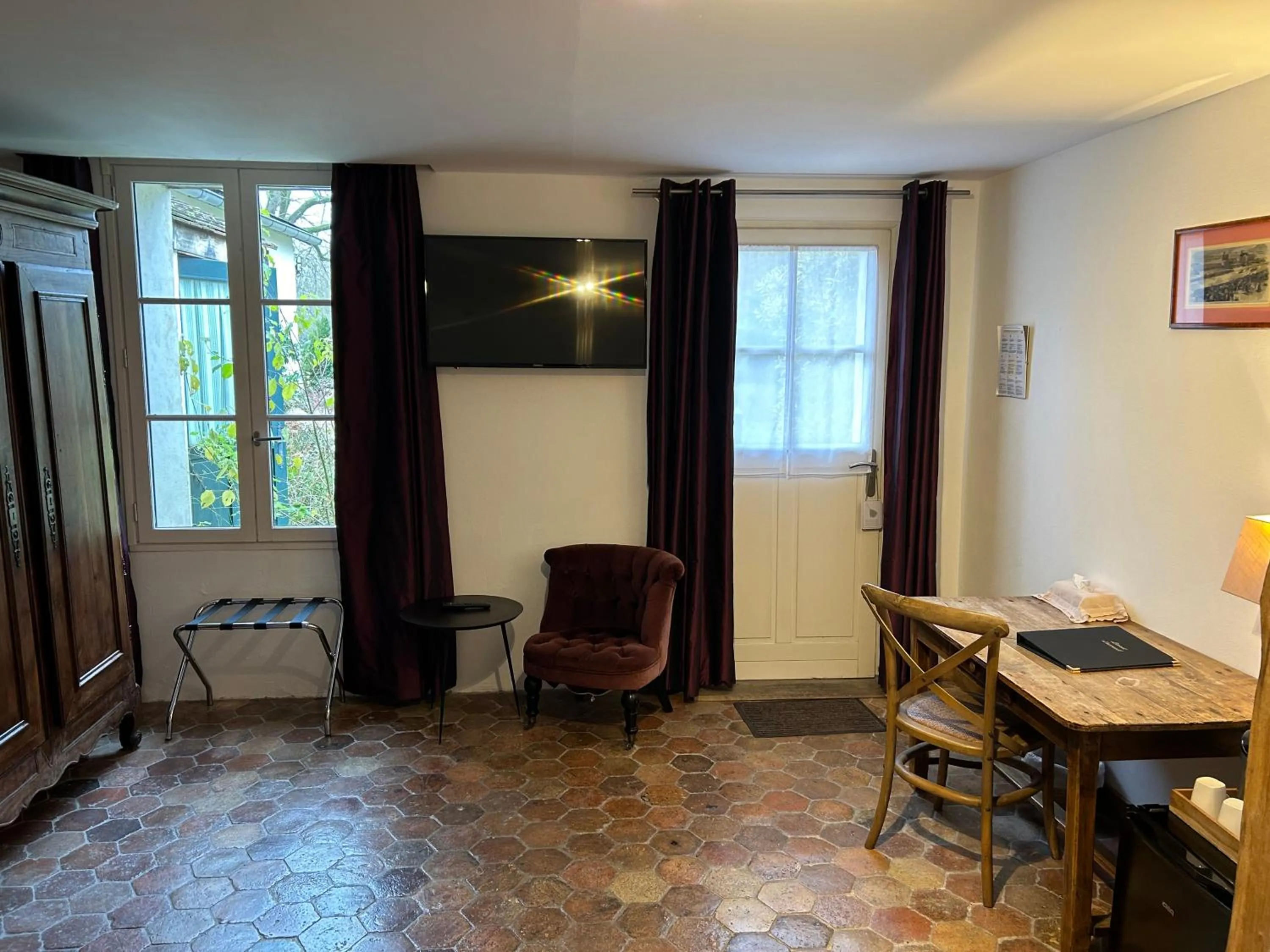 Bedroom in Hotel L'Aunette Cottage