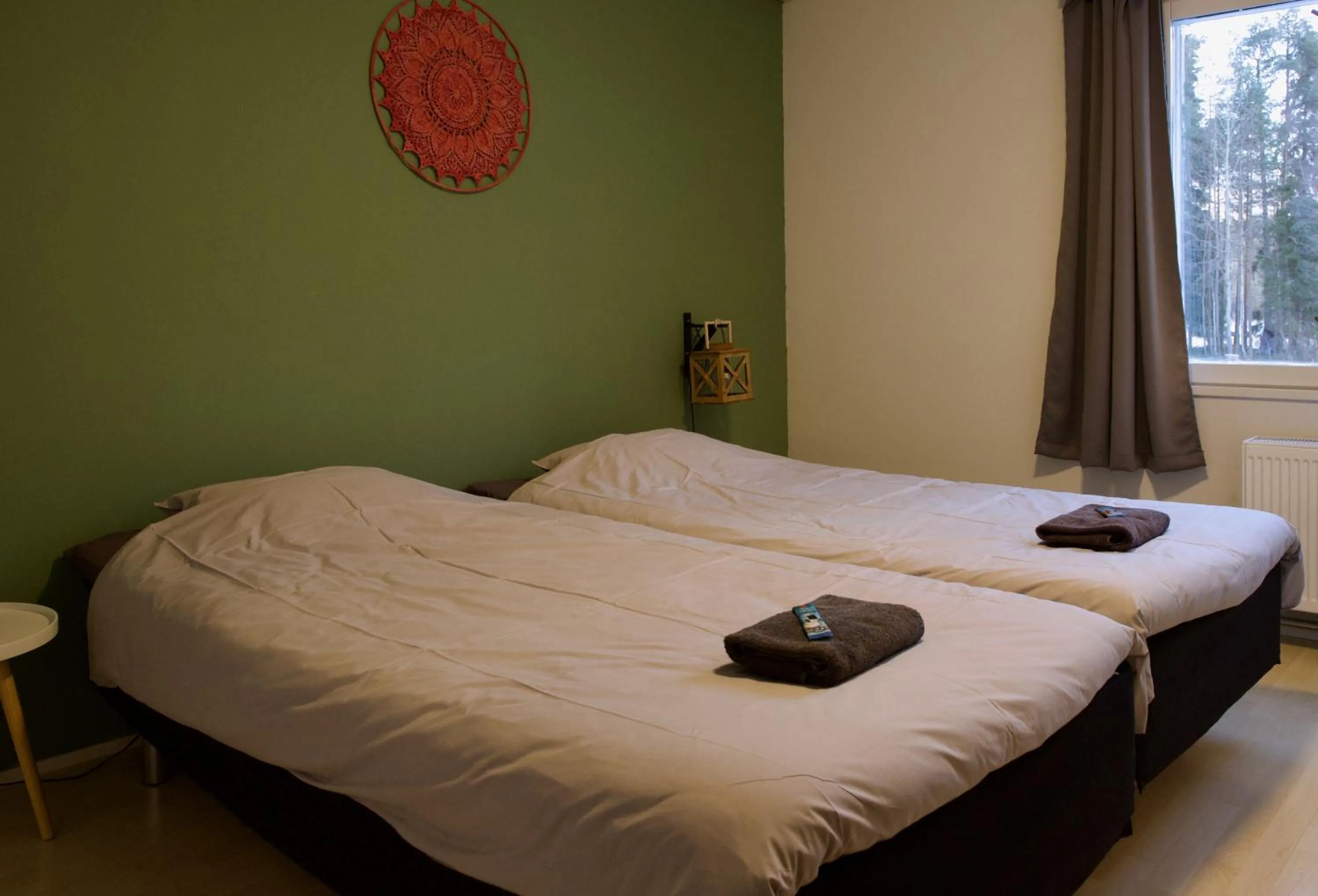 Bed in Taigaschool Eco Hotel