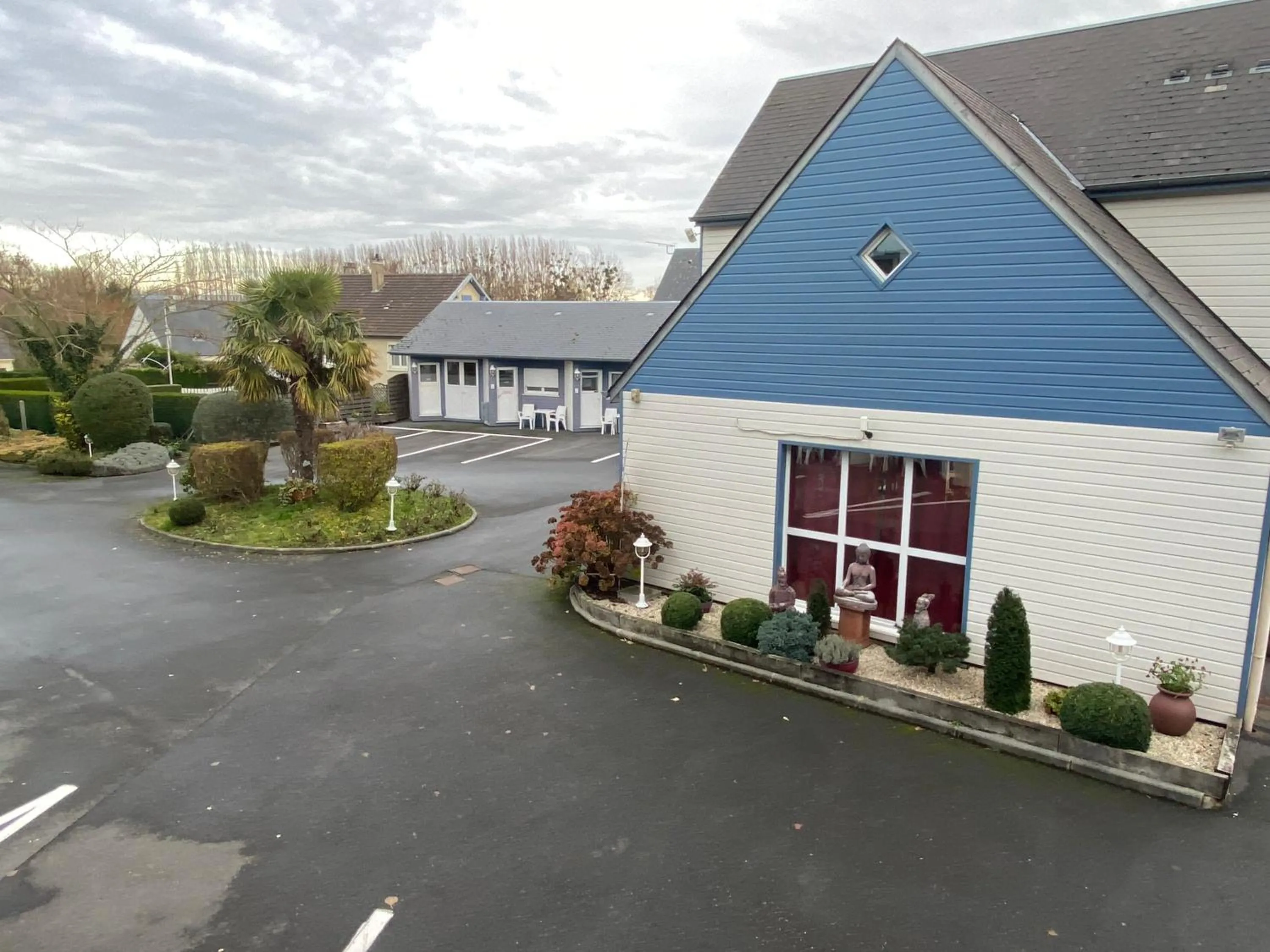 Property building in Contact hôtel - Hôtel Les Bleuets & SPA