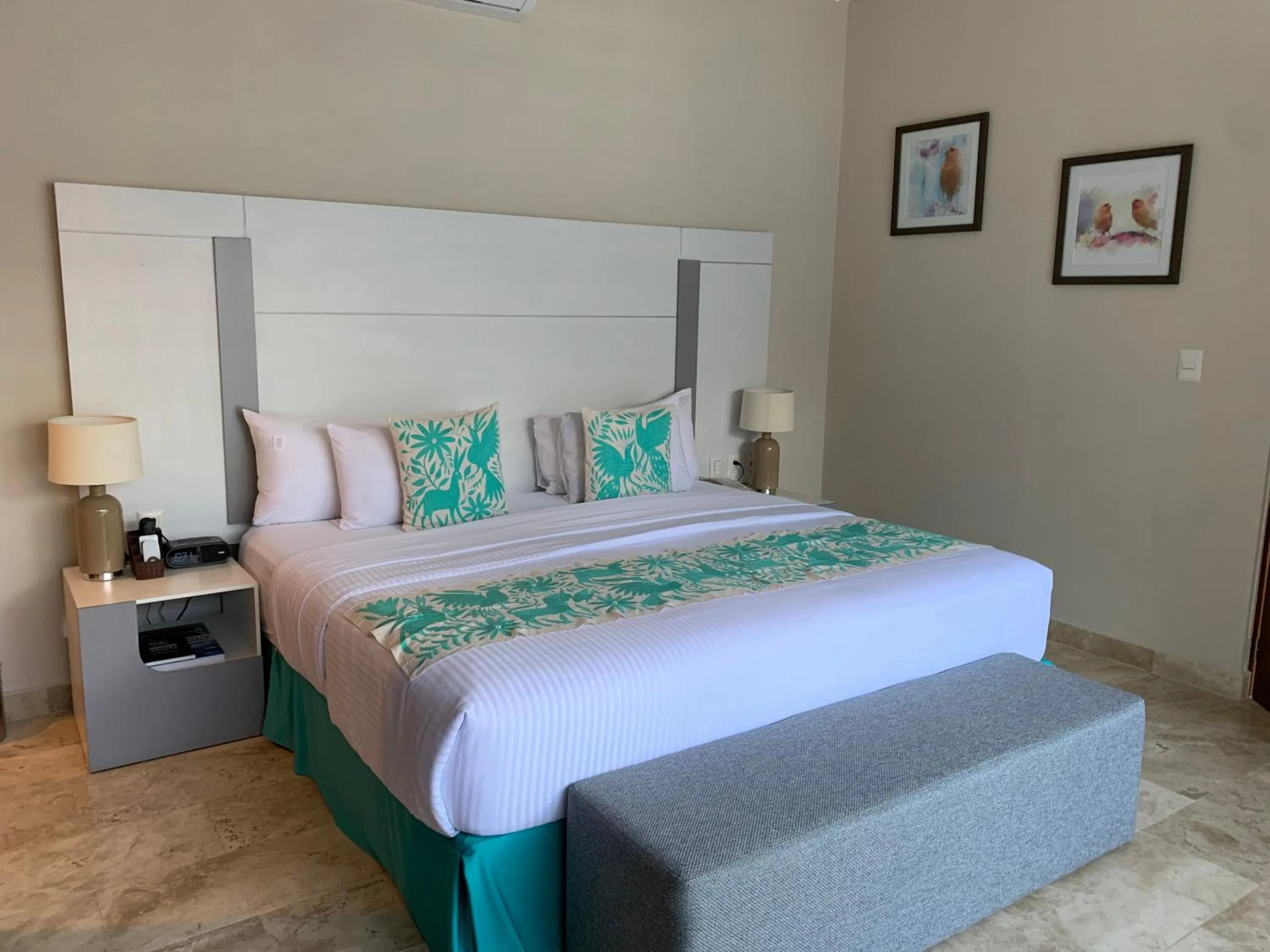 Bed in Xaha Villas Suites & Golf Resort