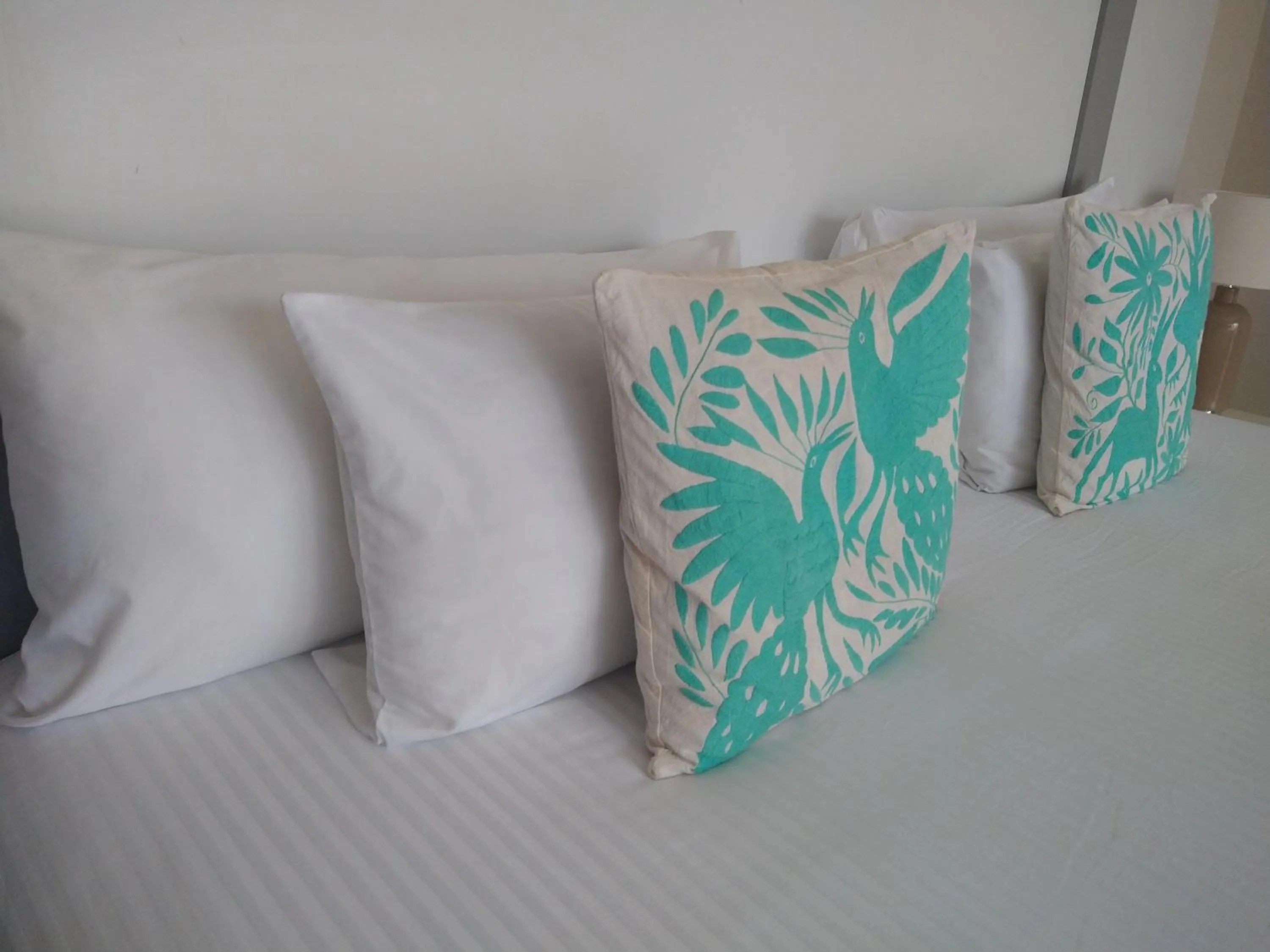 Bed in Xaha Villas Suites & Golf Resort