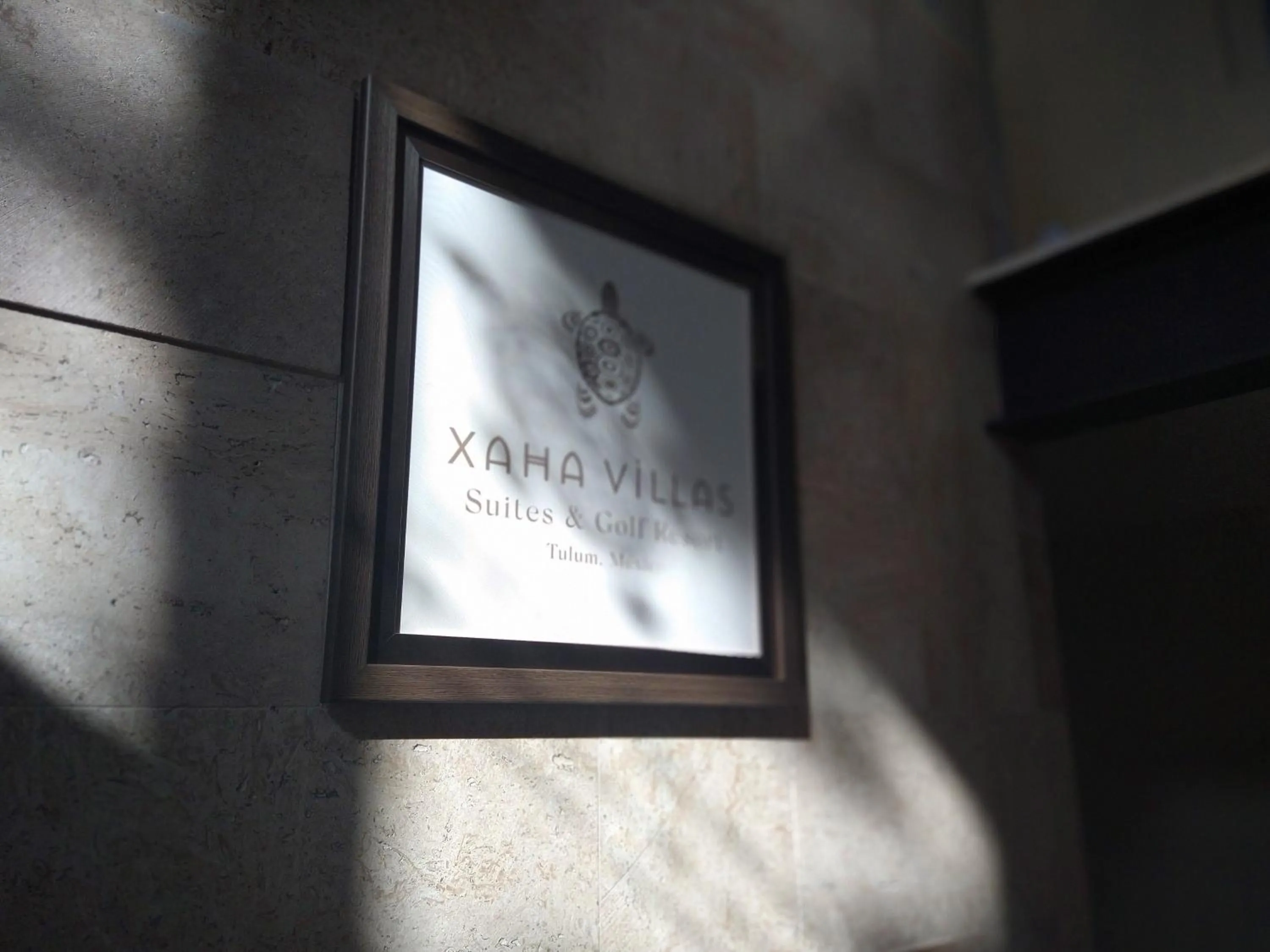 Property logo or sign in Xaha Villas Suites & Golf Resort