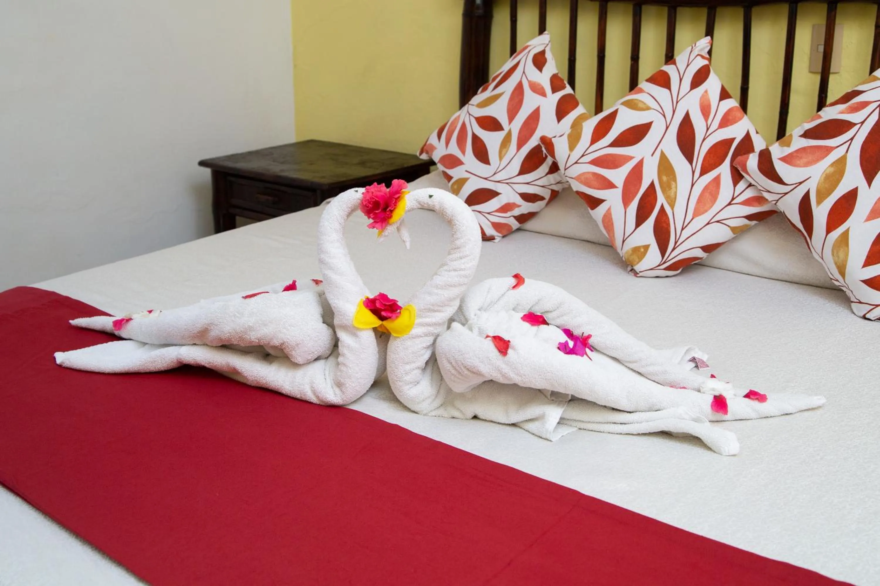 Bed in Hotel Zihua Caracol