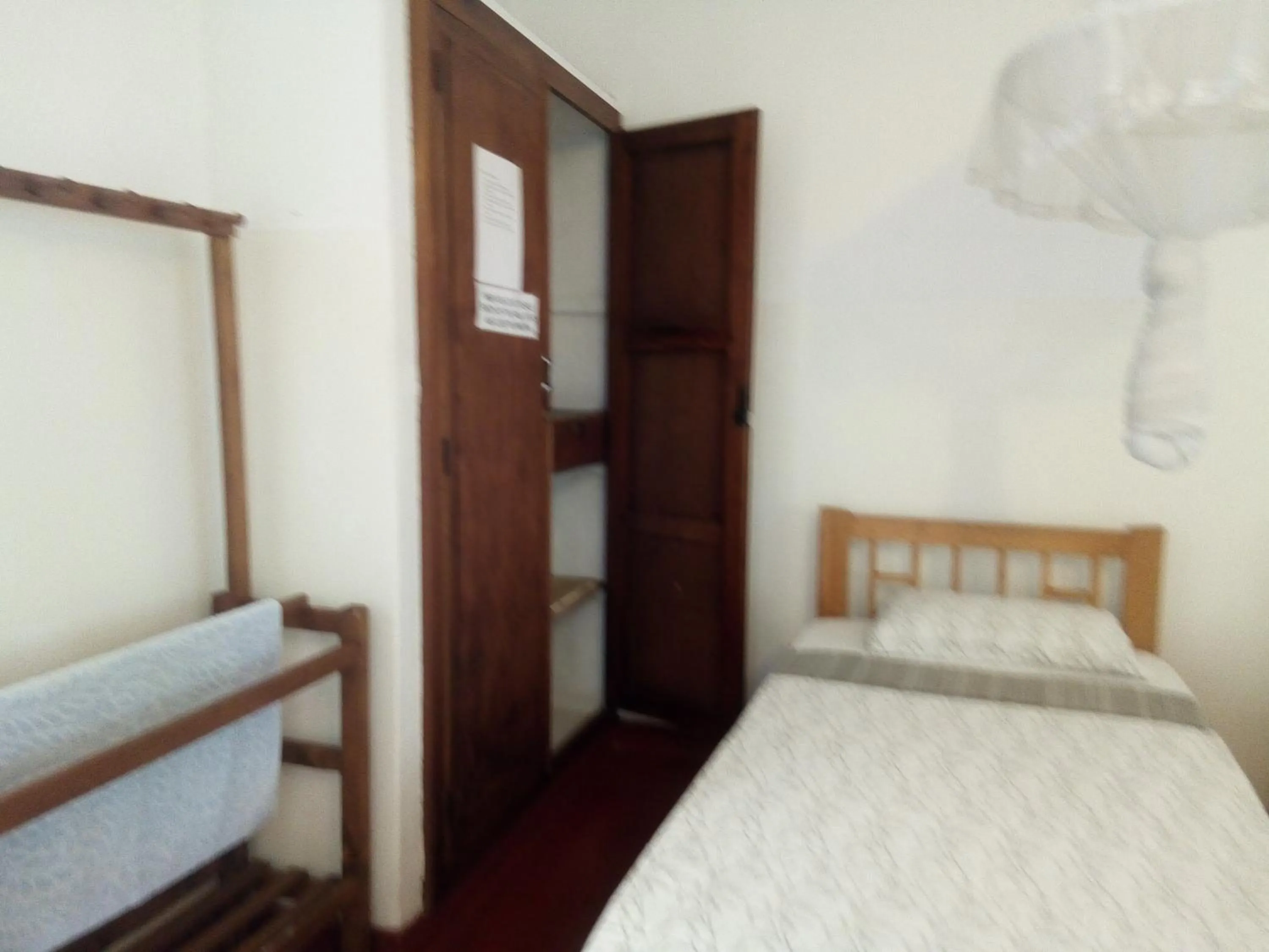 Bed in Hotel Mango Garden